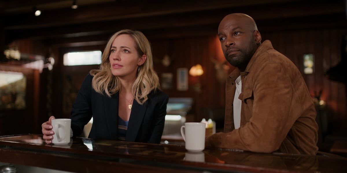 Brie and Preacher sitting at the bar in 'Virgin River' Season 5