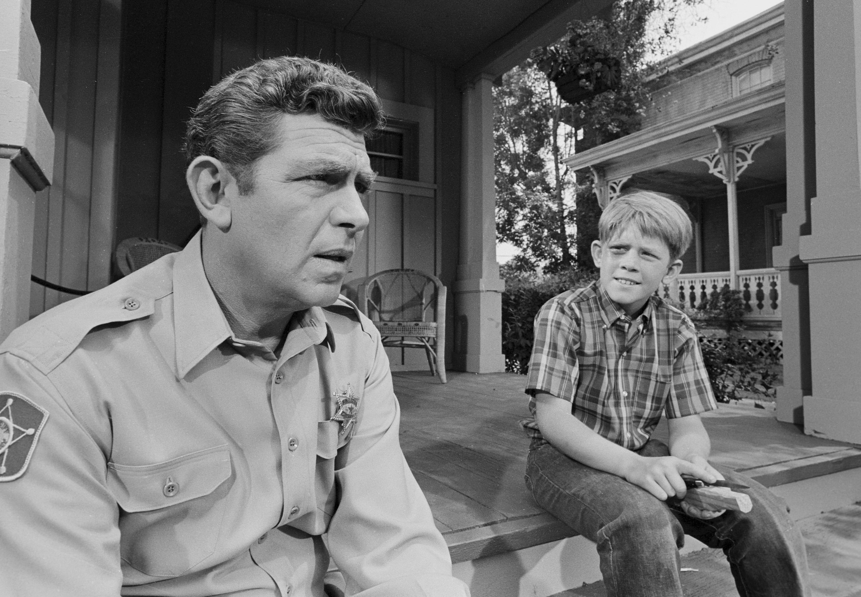 Andy Griffith and Ron Howard on a porch