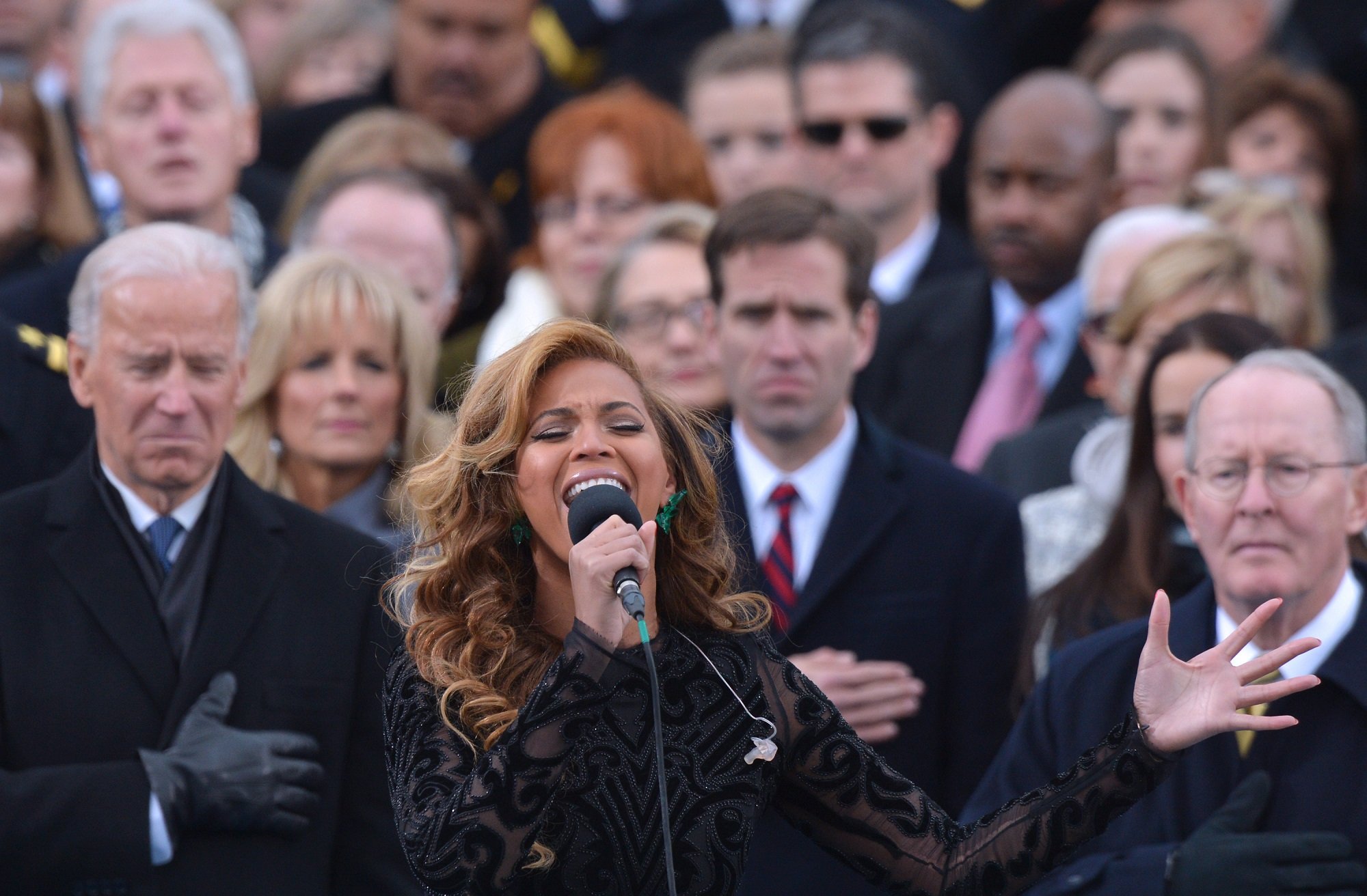Beyoncé performs the National Anthem as Vice President Joe Biden and more listen during the 57th Presidential Inauguration ceremonial swearing-in at the US Capitol on January 21, 2013, in Washington, DC.