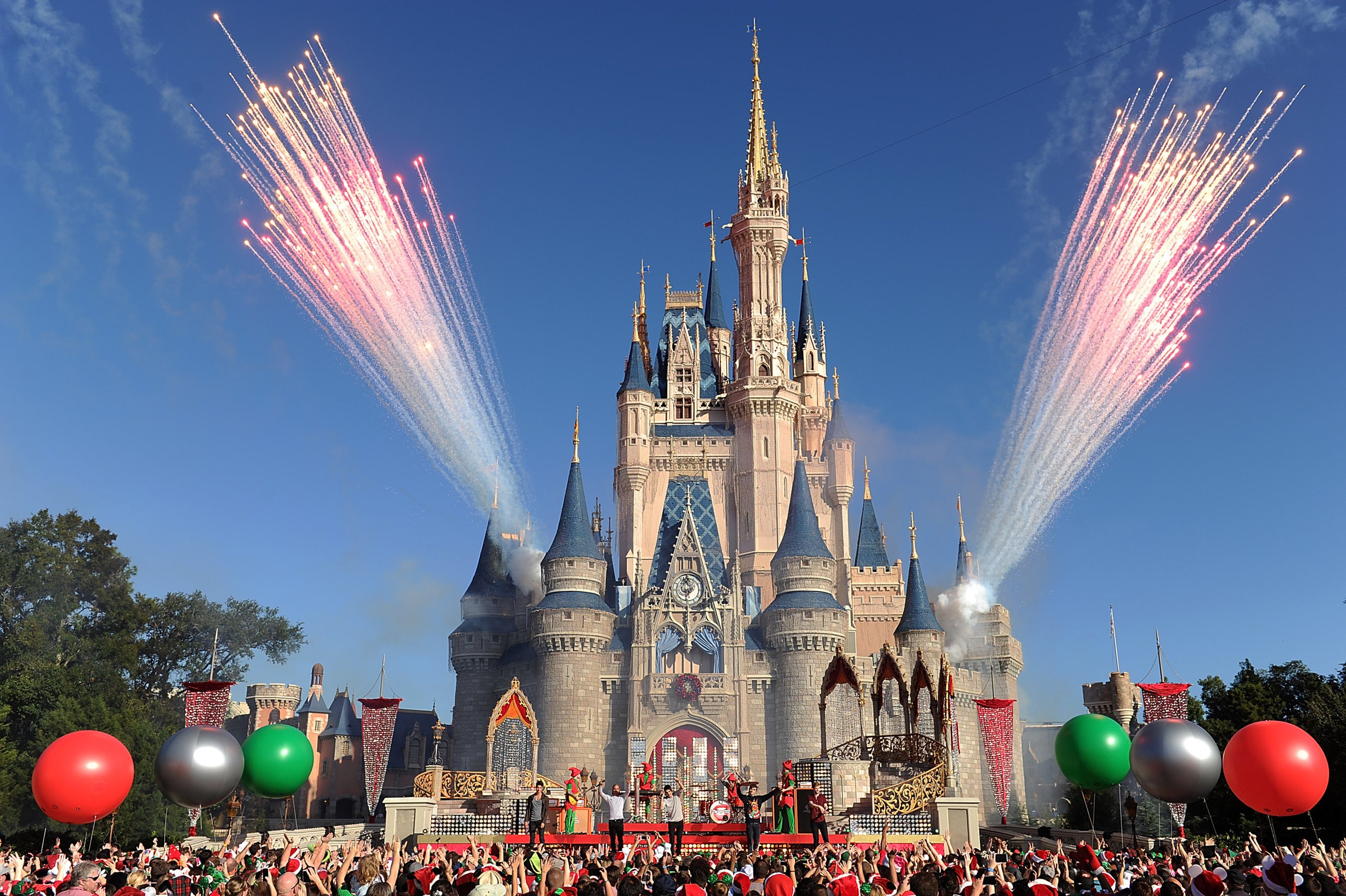 A Disney castle with fireworks