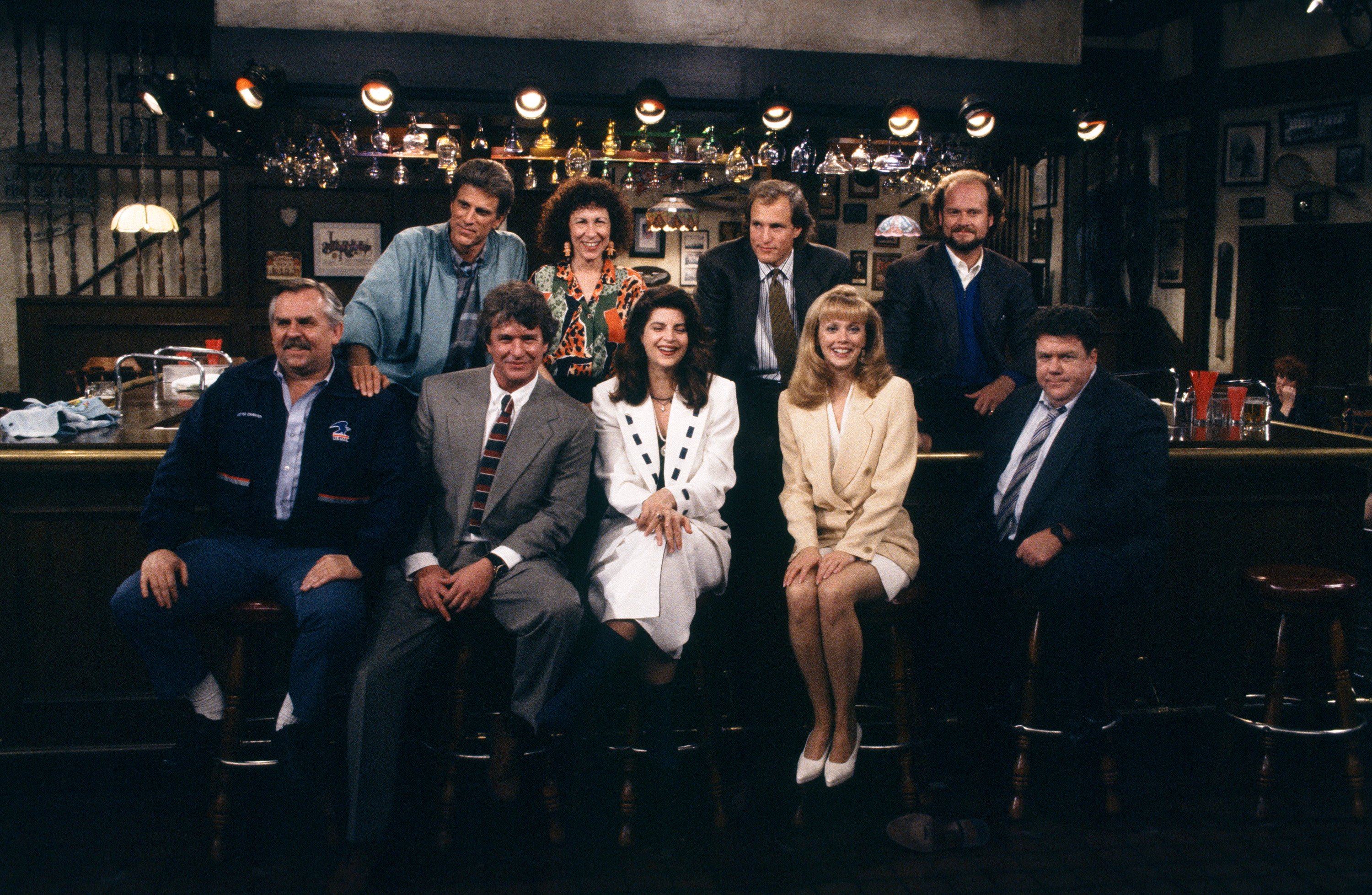 The cast of Cheers at the bar
