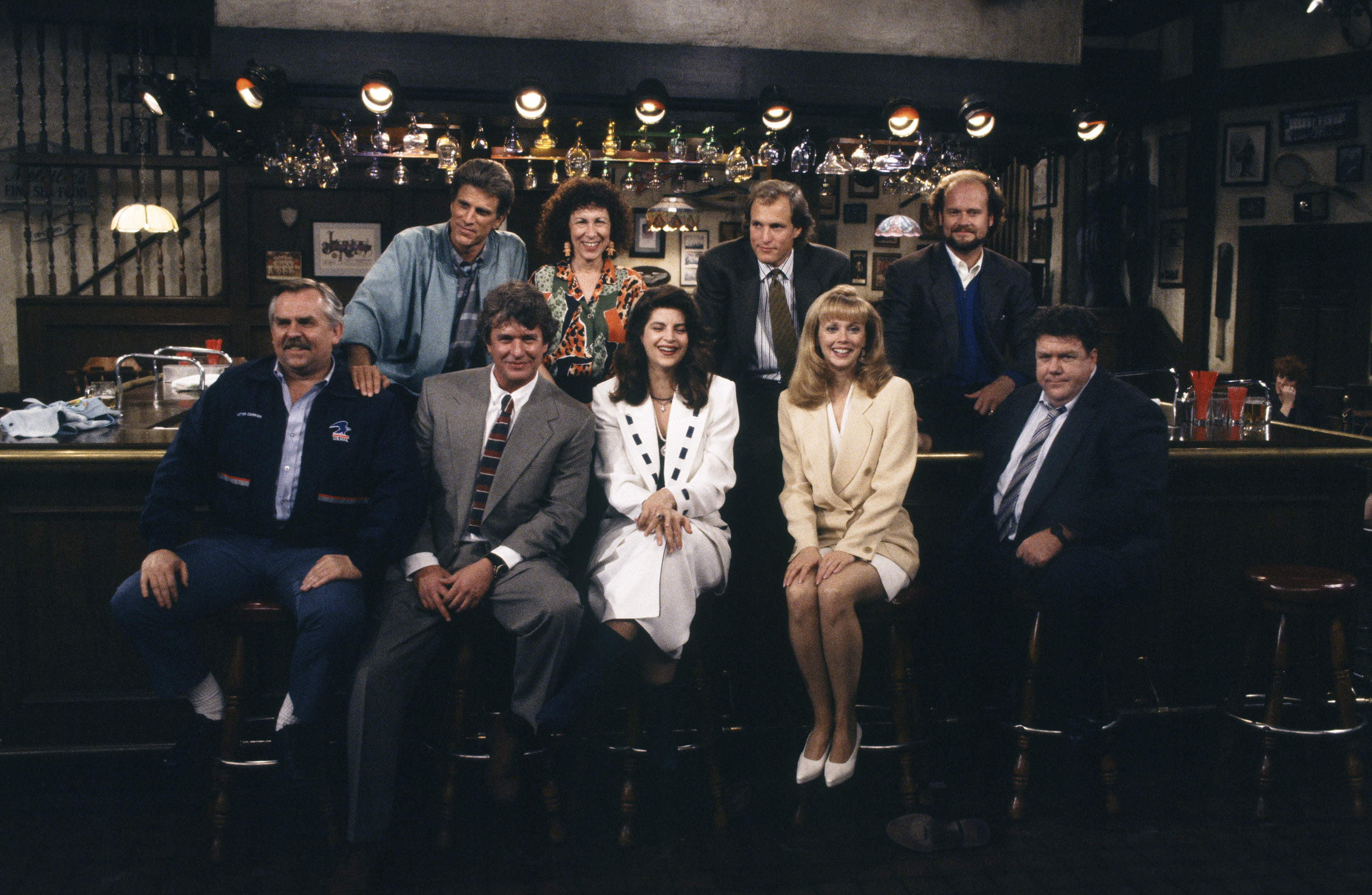 The cast of Cheers at the bar