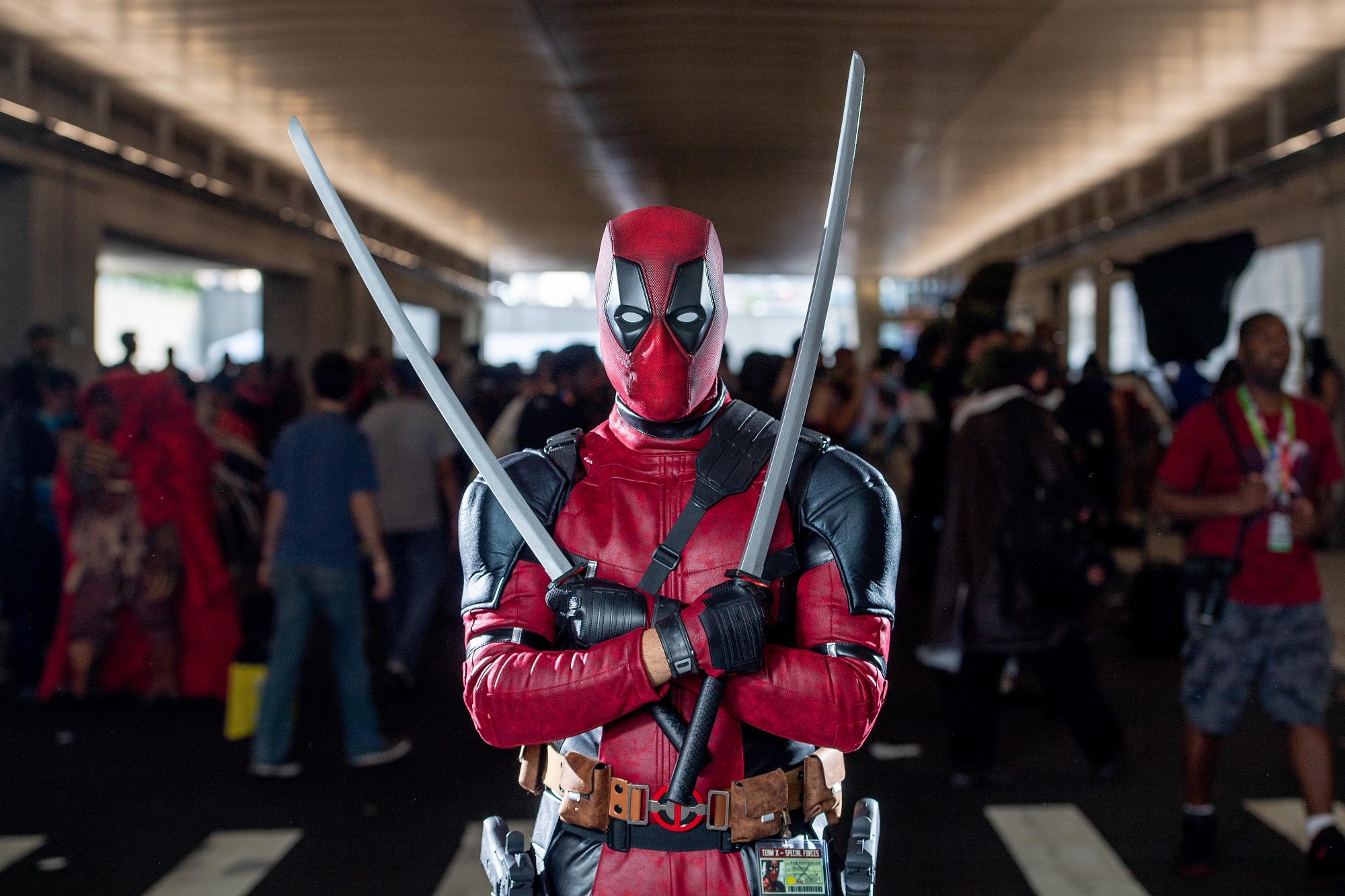 A fan cosplays as Deadpool from the Marvel Universe during the 2018 New York Comic-Con at on October 7, 2018.
