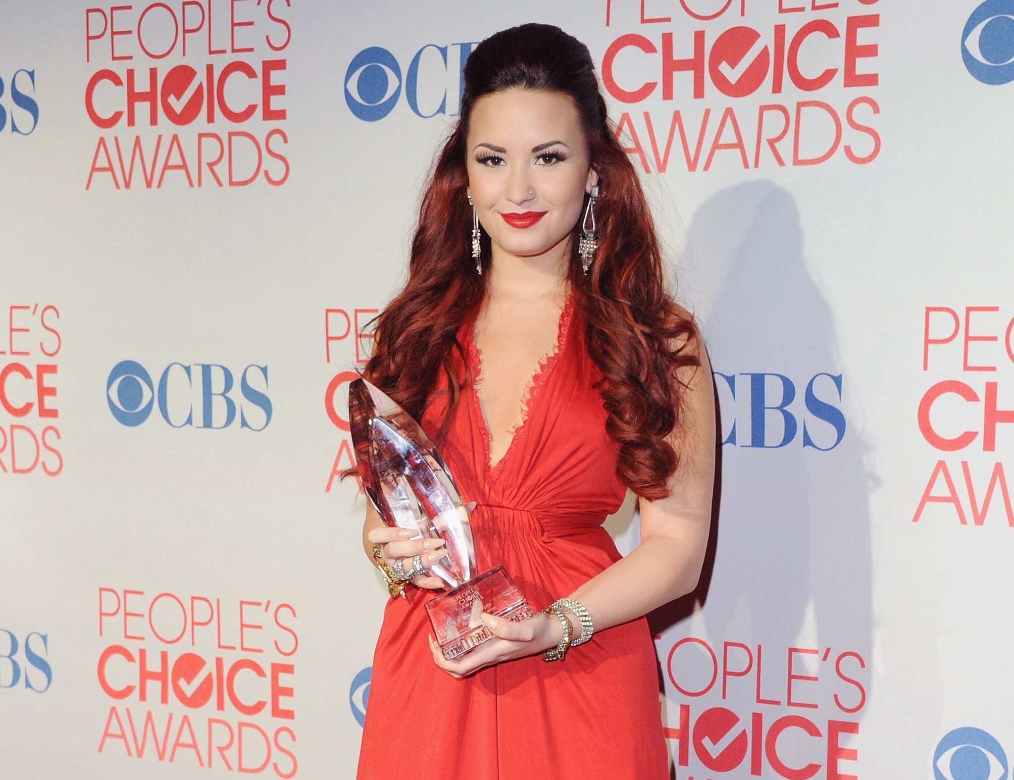 Demi Lovato poses at the 2012 People's Choice Awards Press Room on January 11, 2012 in Los Angeles, California.