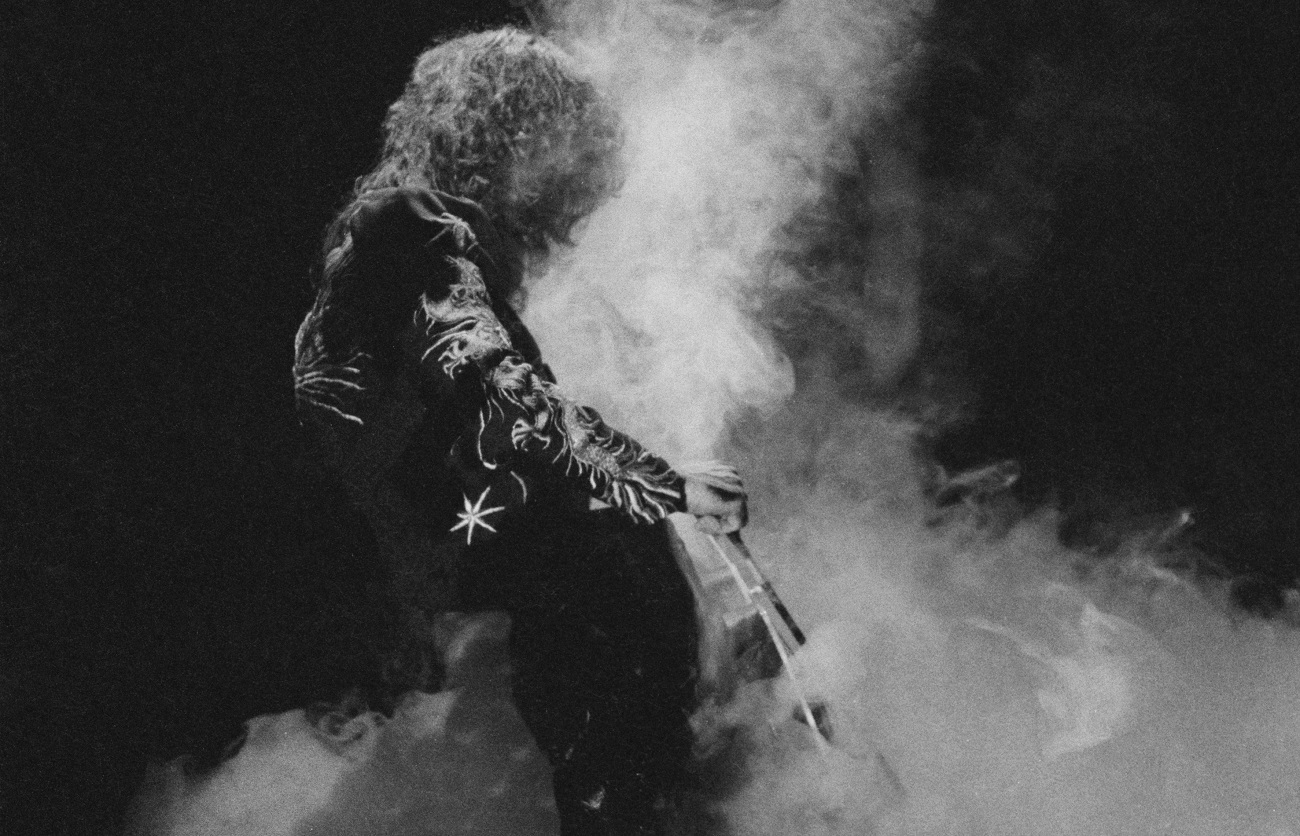 Jimmy Page engulfed in smoke on stage