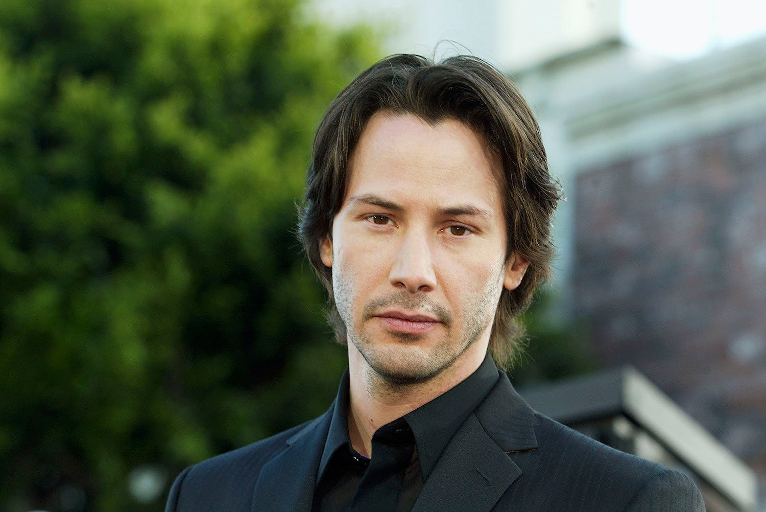Keanu Reeves arrives at the premiere of The Matrix Reloaded at the Village Theater on May 7, 2003