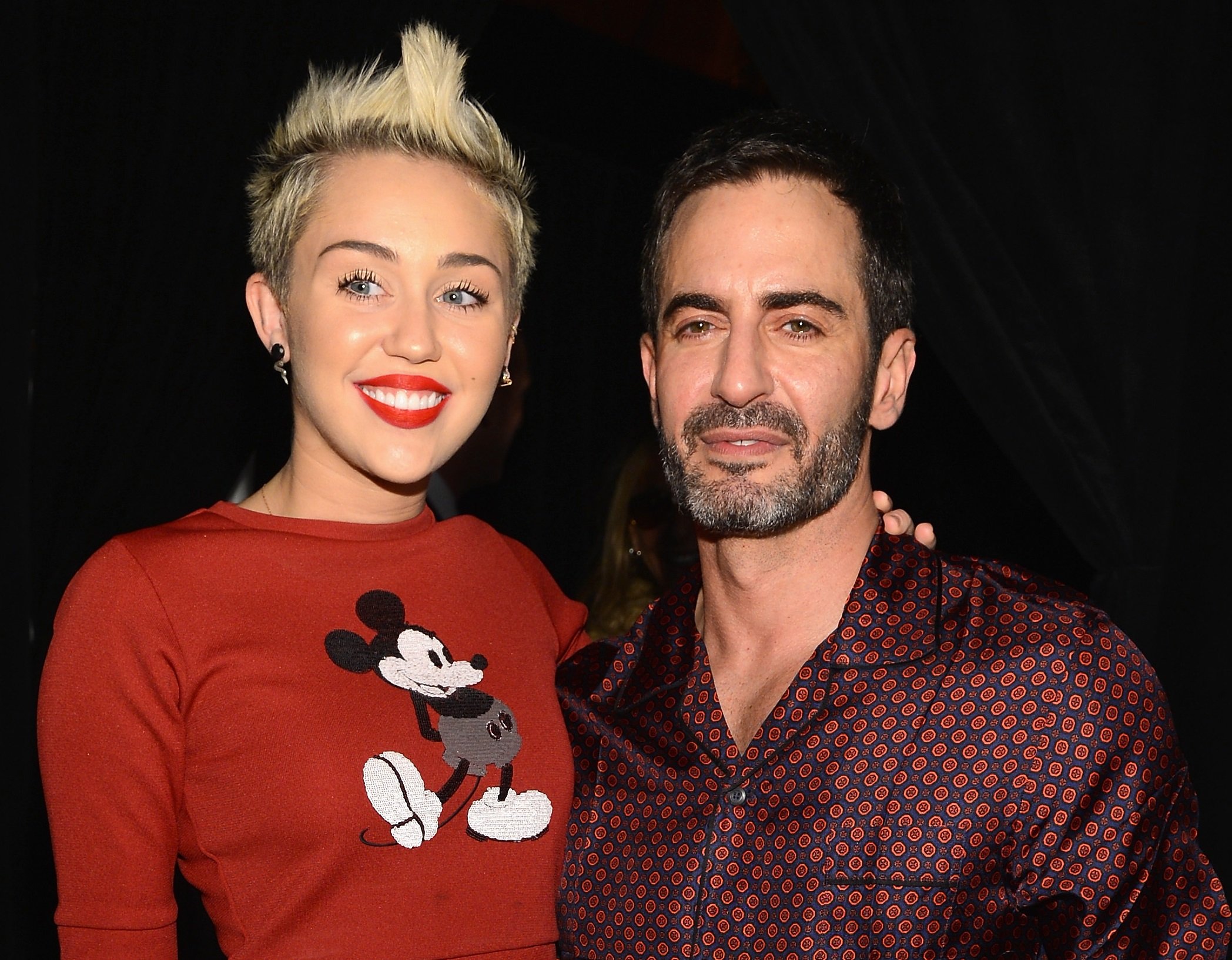 Miley Cyrus (L) and Marc Jacobs