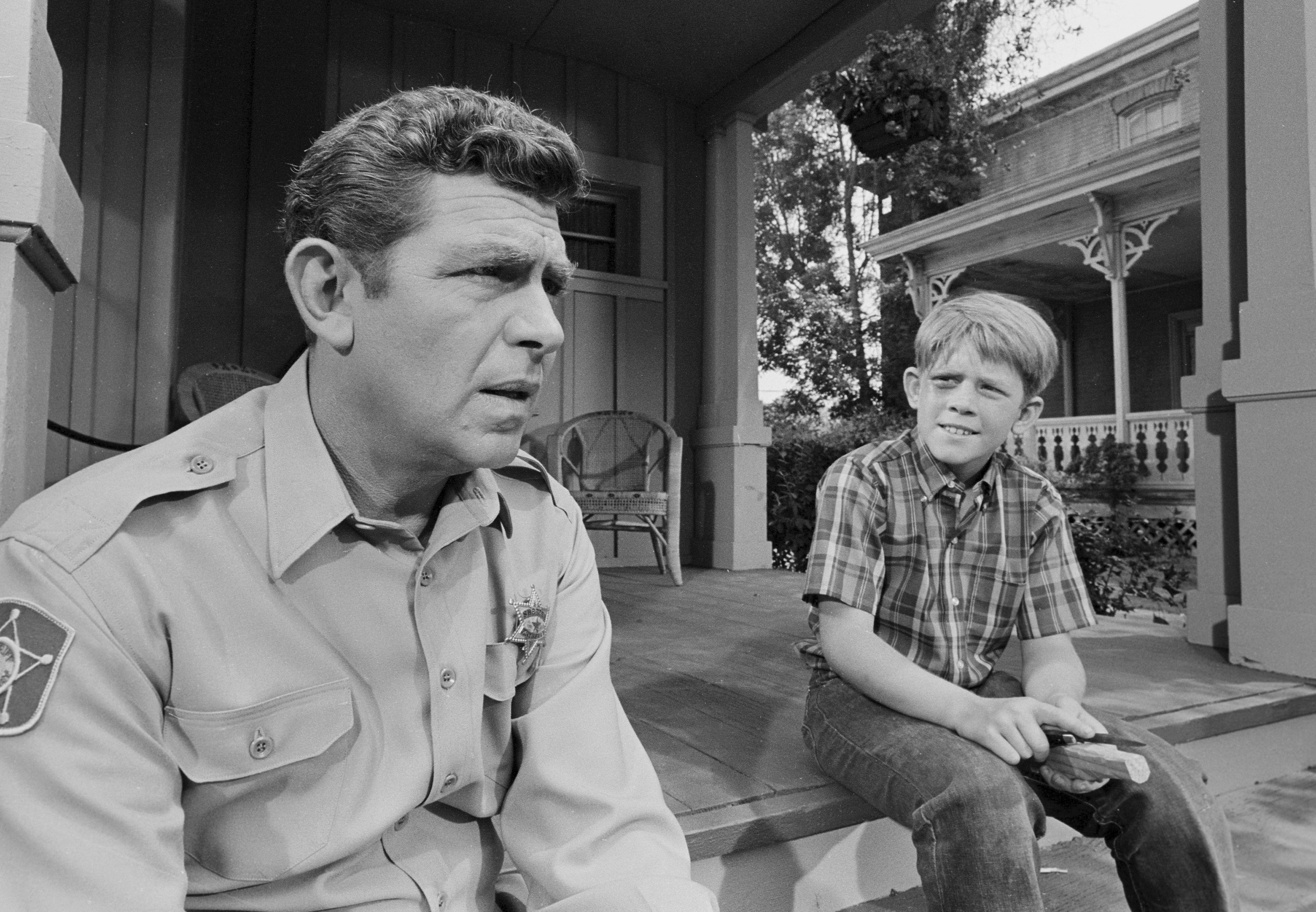 Andy Griffith and Ron Howard on a porch