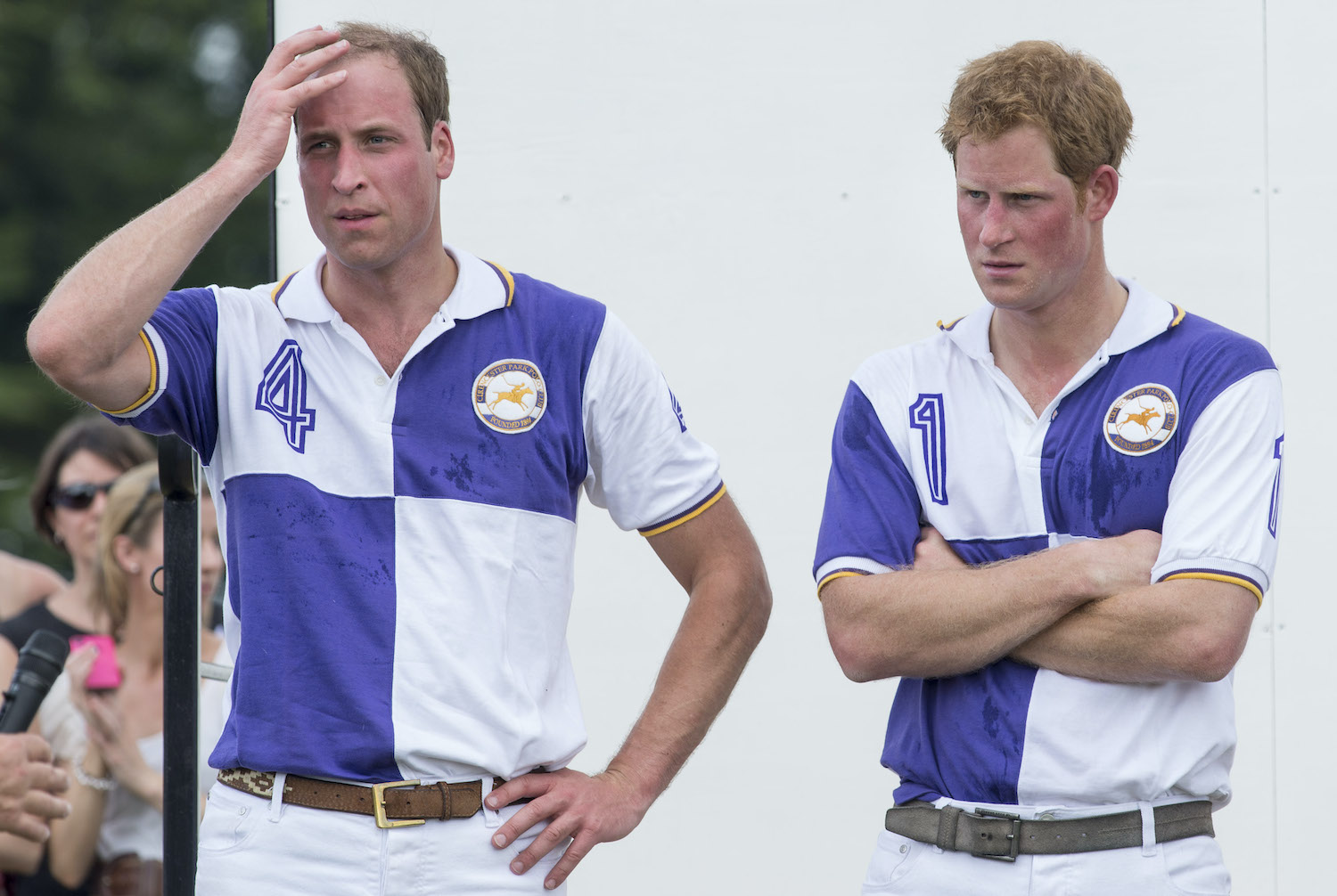 Prince William and Prince Harry attend the presentations after taking part in The Jerudong Trophy at Cirencester Park Polo Club on July 14, 2013