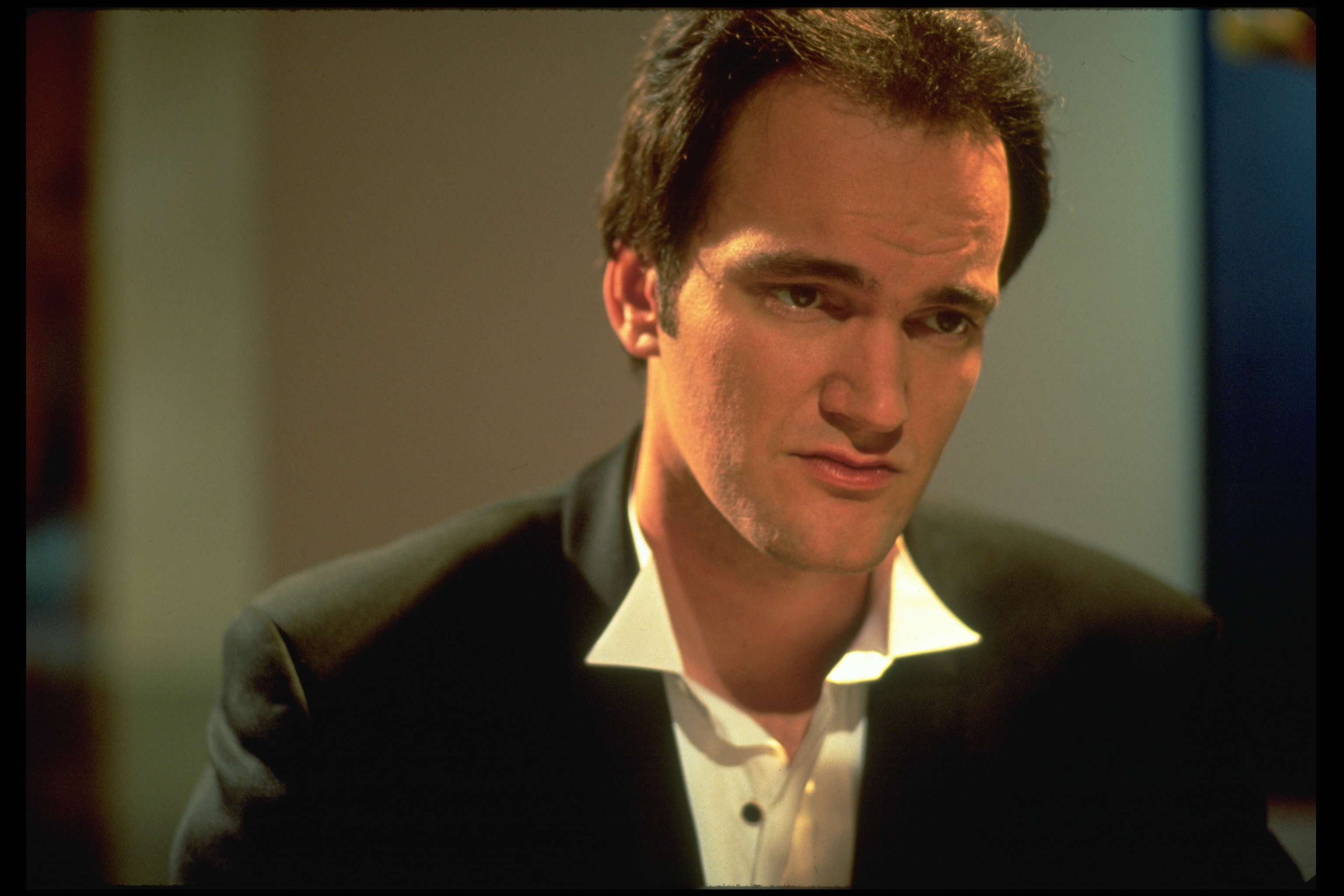 Quentin Tarantino wearing a collared shirt