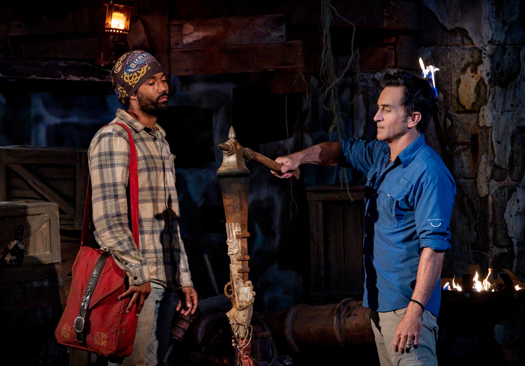 Jeff Probst extinguishes Wendell Holland's torch on Survivor