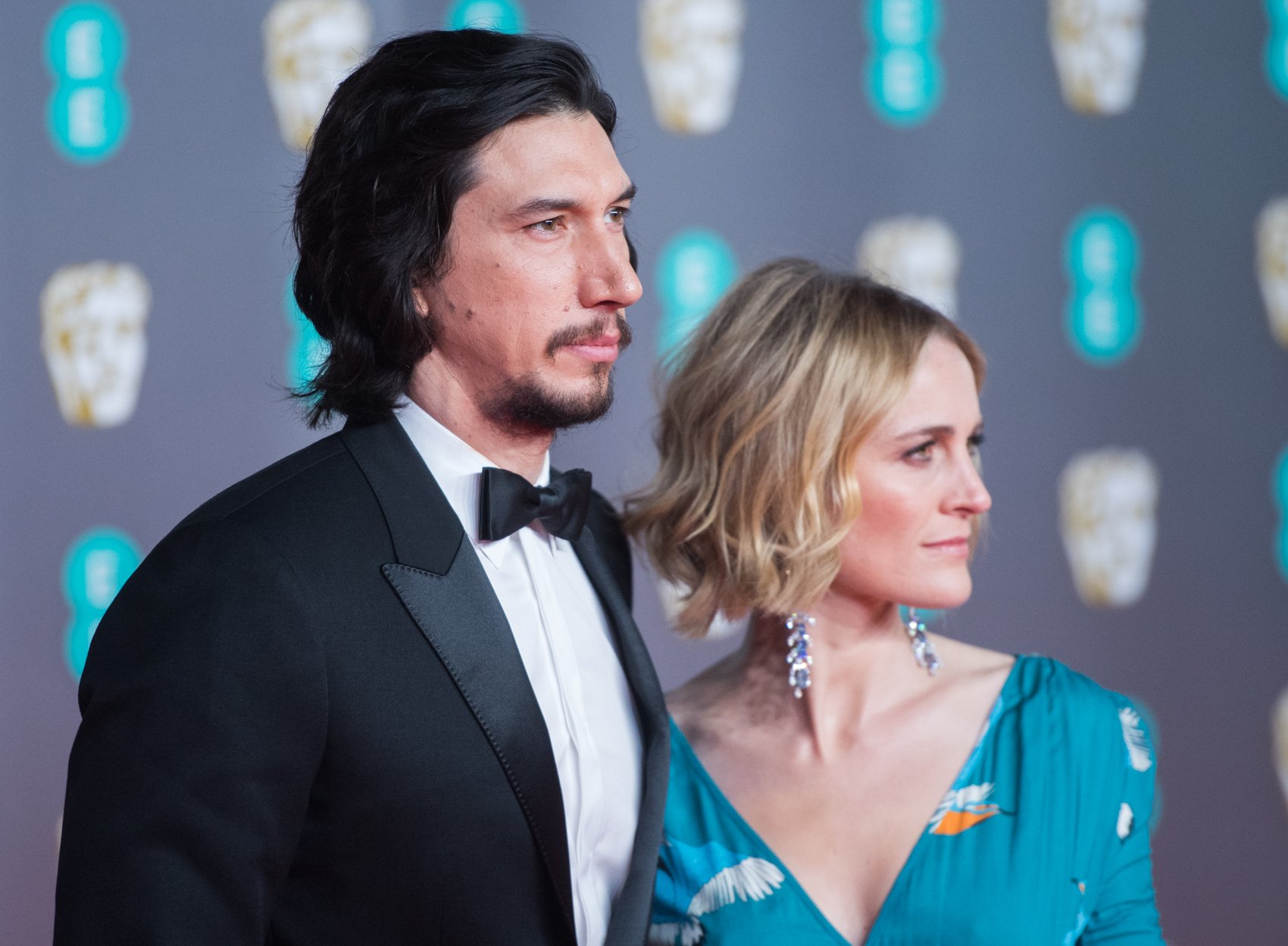 Adam Driver and Joanne Tucker attend the EE British Academy Film Awards