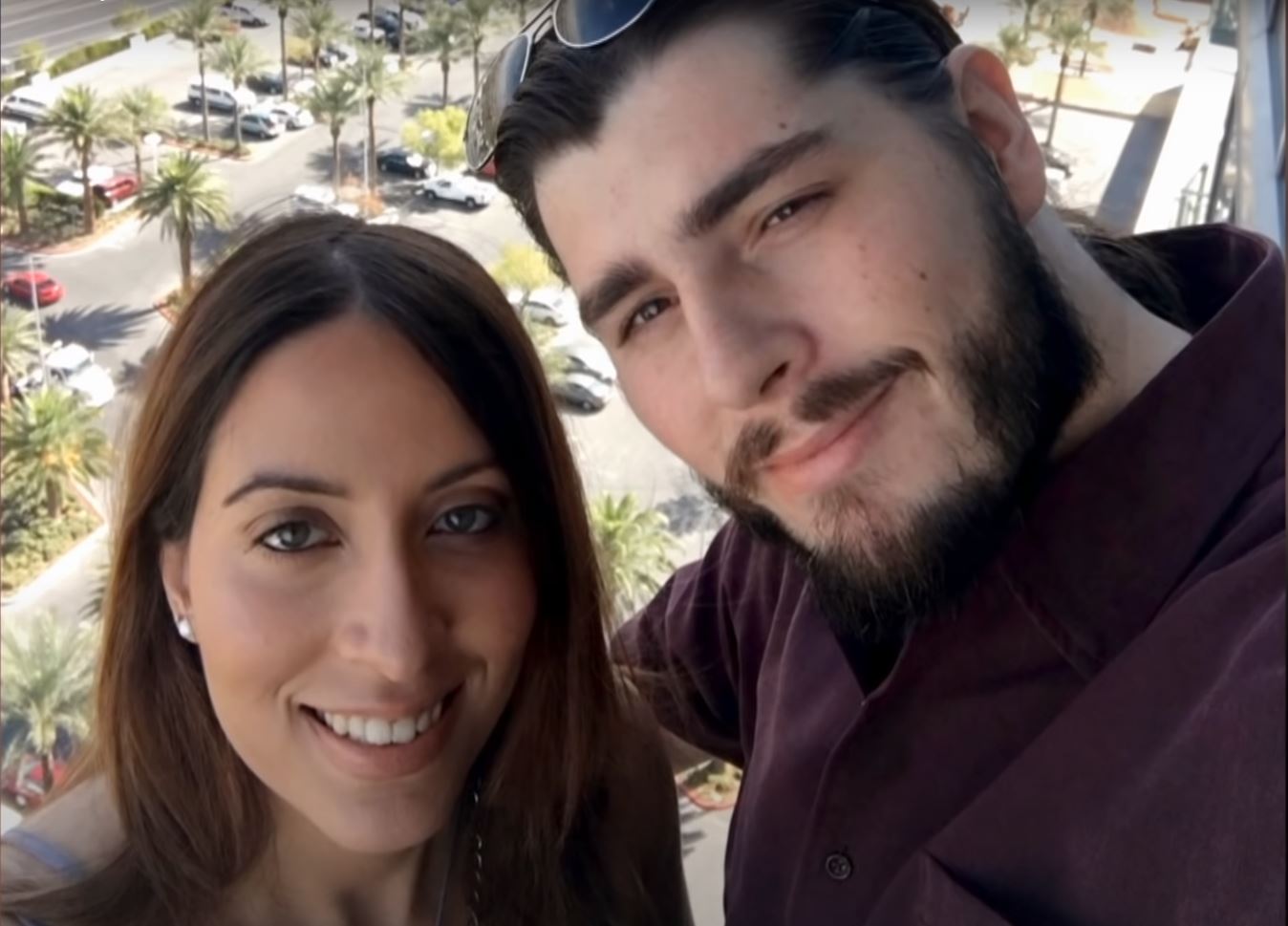 Andrew Kenton poses with Amira from 90 Day Fiancé