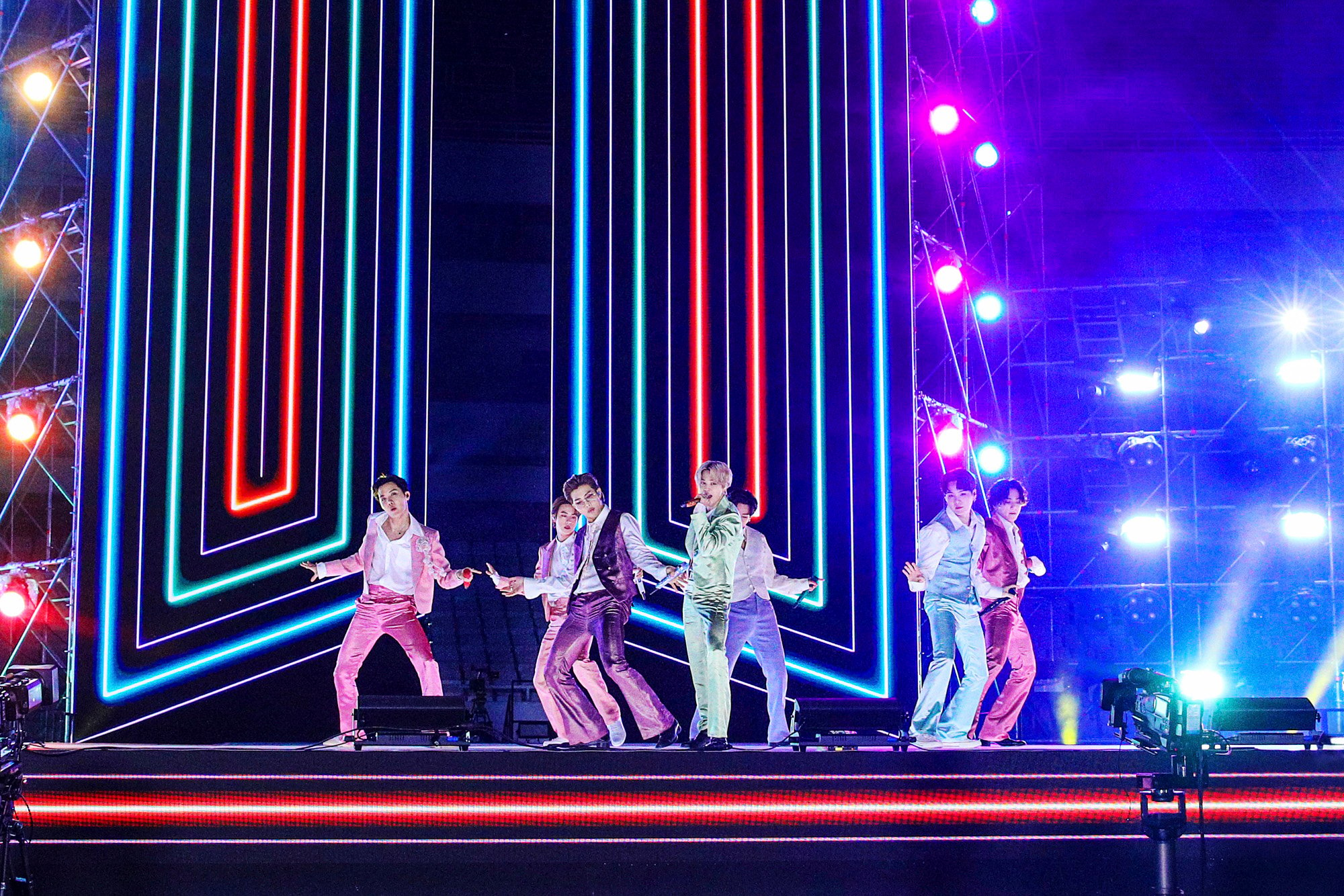 J-Hope, Jin, RM, Jimin, V, Suga, and Jungkook of BTS perform onstage for the 2020 American Music Awards