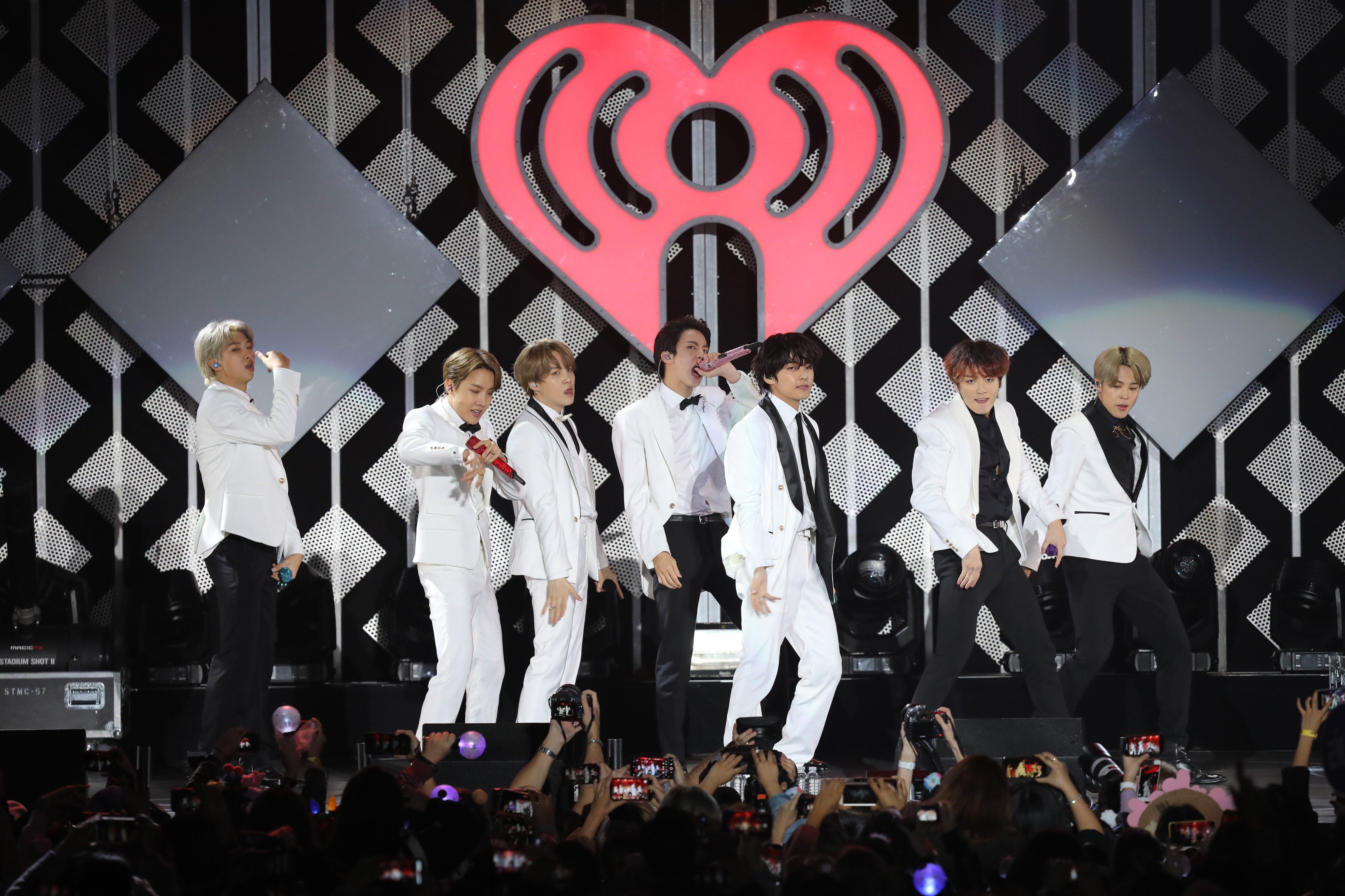 V, Suga, Jin, Jungkook, RM, Jimin, and J-Hope of BTS performs during the iHeartRadio KIIS FM's Jingle Ball 