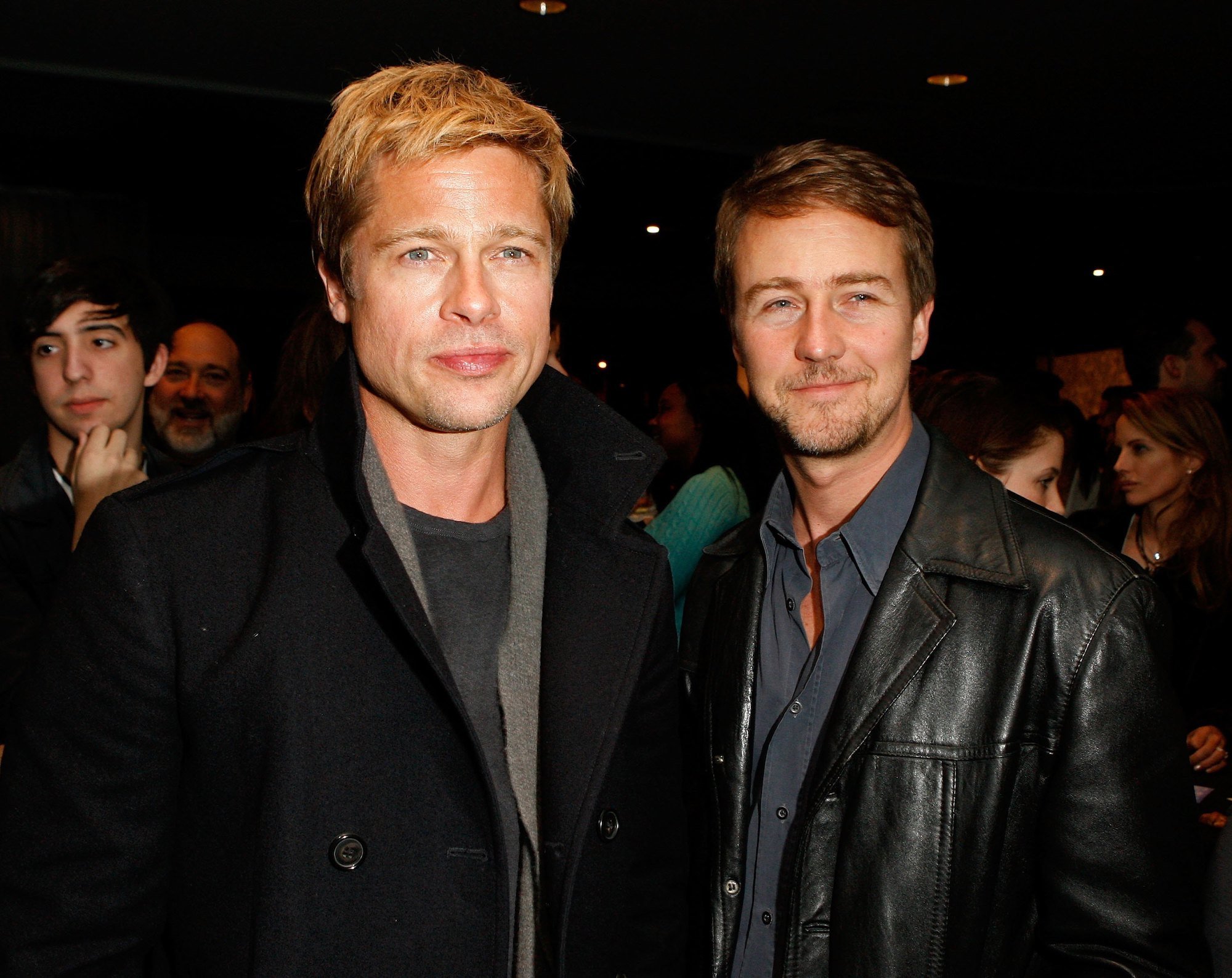 (L-R) Brad Pitt and Edward Norton smiling, looking to the right of the camera