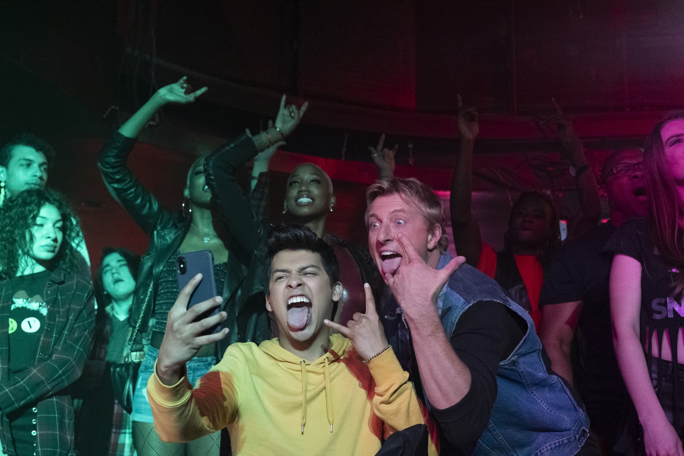 Cobra Kai: Johnny Lawrence and Miguel at a Dee Snider concert