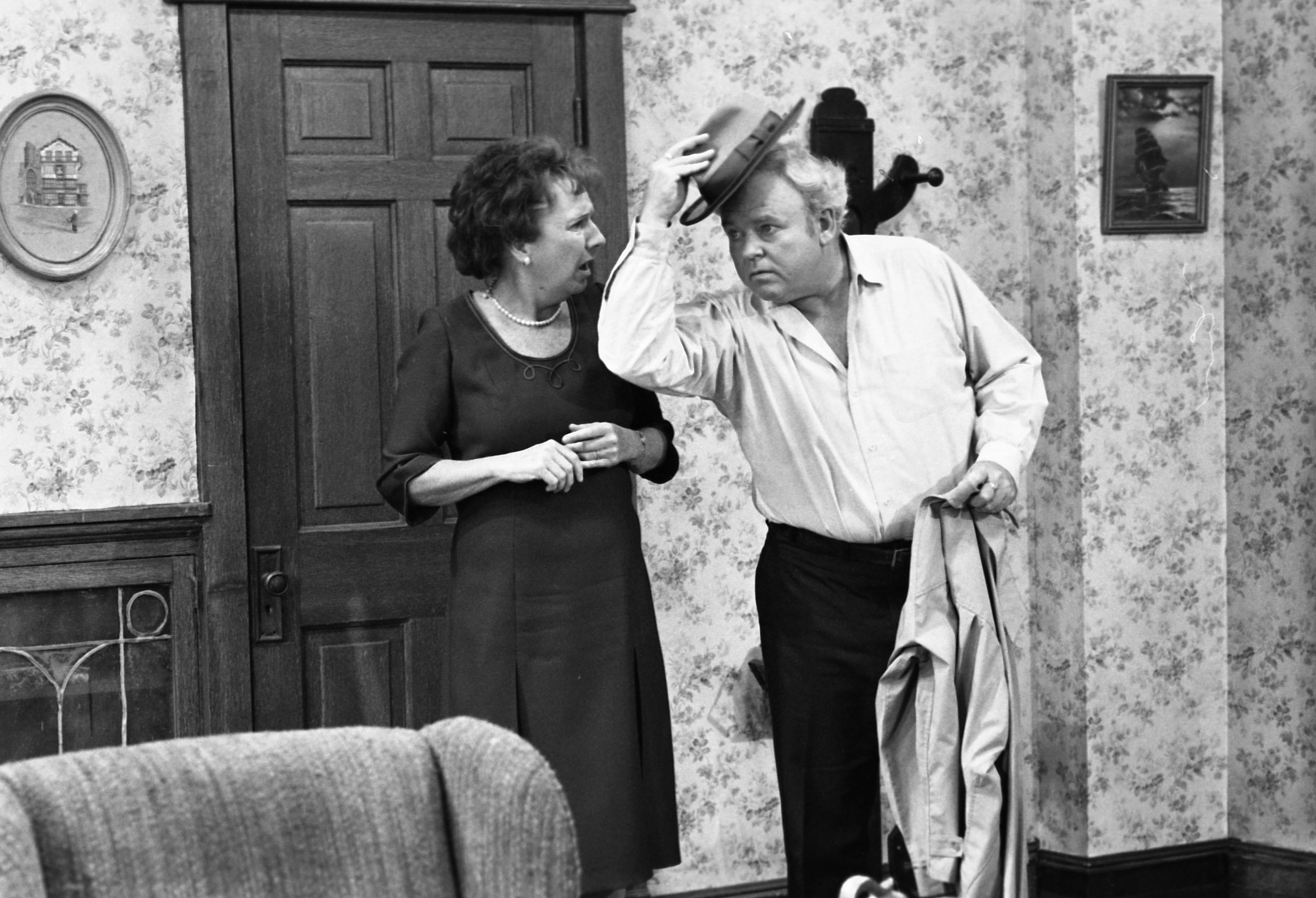 Carroll O'Connor and Jean Stapleton on the set of 'All in the Family' in 1978 | Ron Eisenberg/Michael Ochs Archives/Getty Images