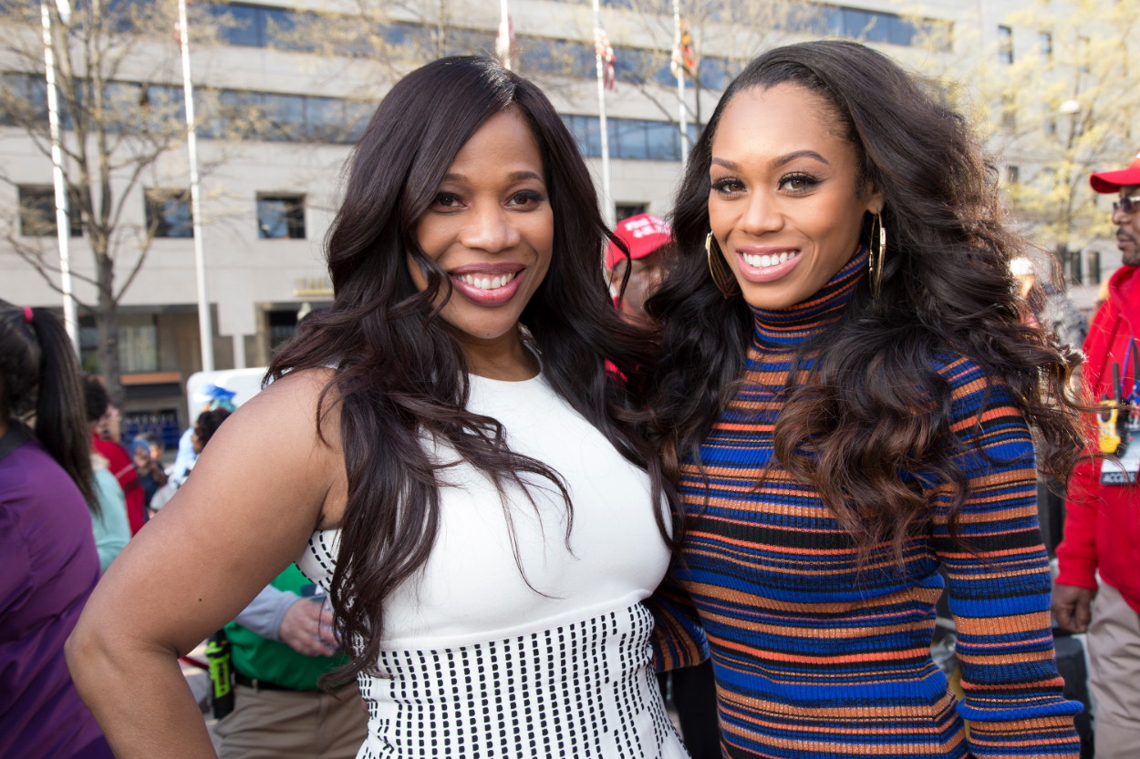 Charrisse Jackson Jordan (L) and Monique Samuels (R) attends D.C. Emancipation Day at Freedom Plaza