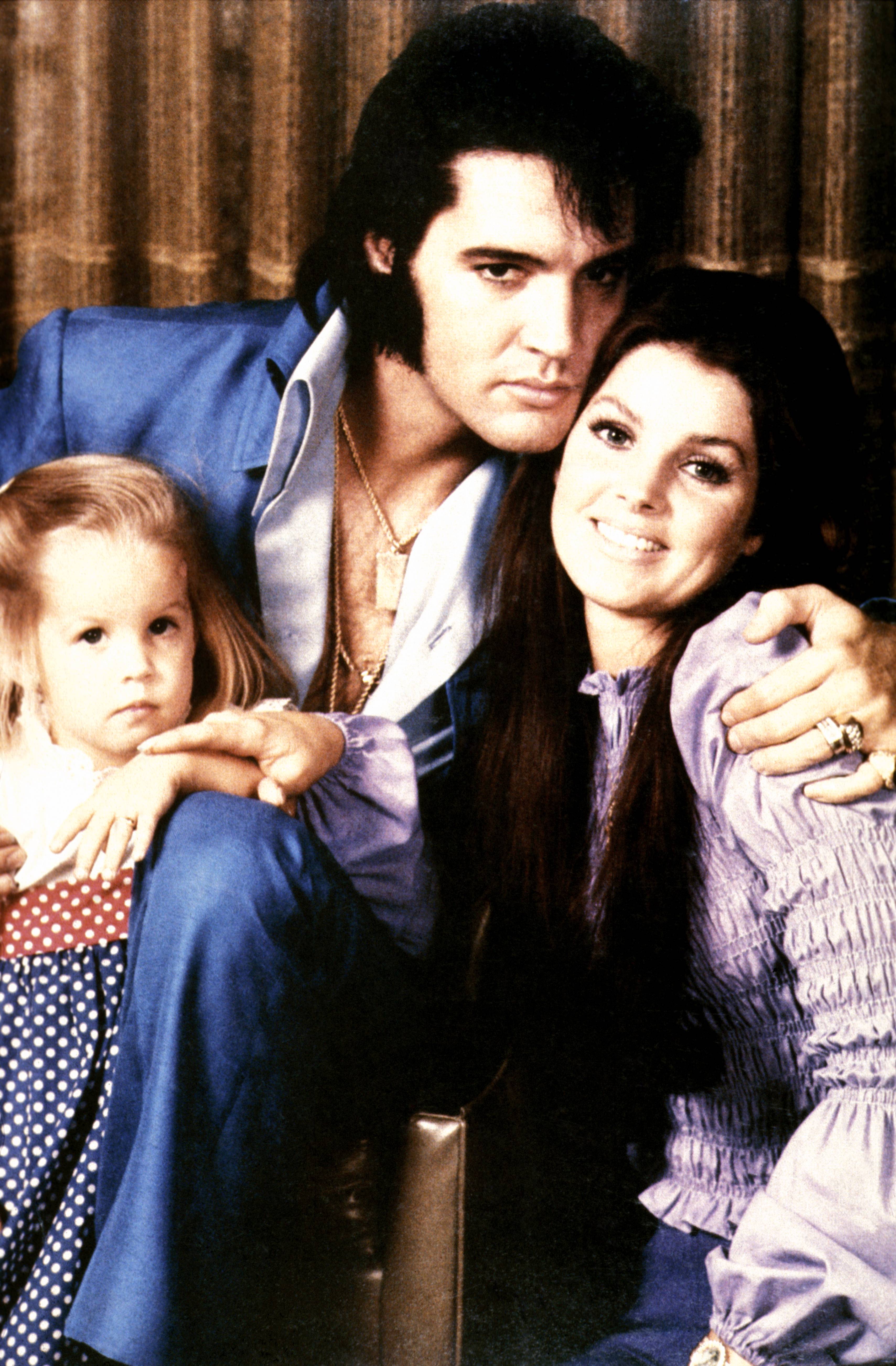  Elvis Presley with Priscilla Presley and their daughter Lisa Marie Presley