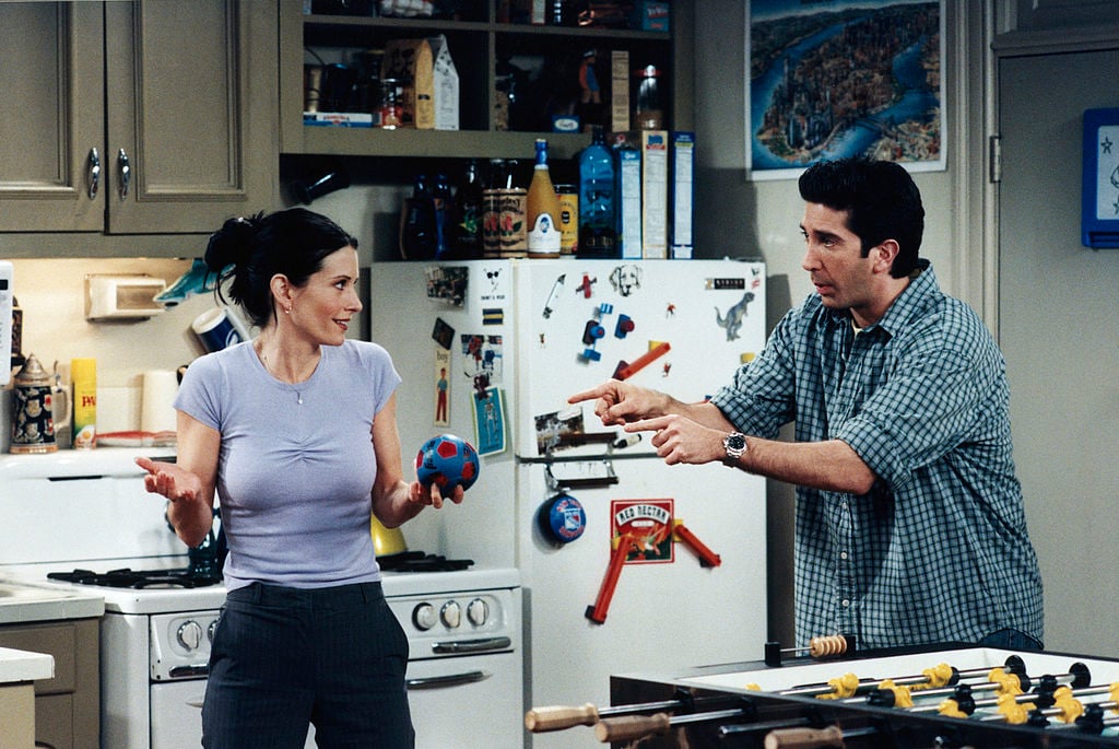 Courteney Cox as Monica Geller, David Schwimmer as Ross Geller on Friends Season 5 Episode 21