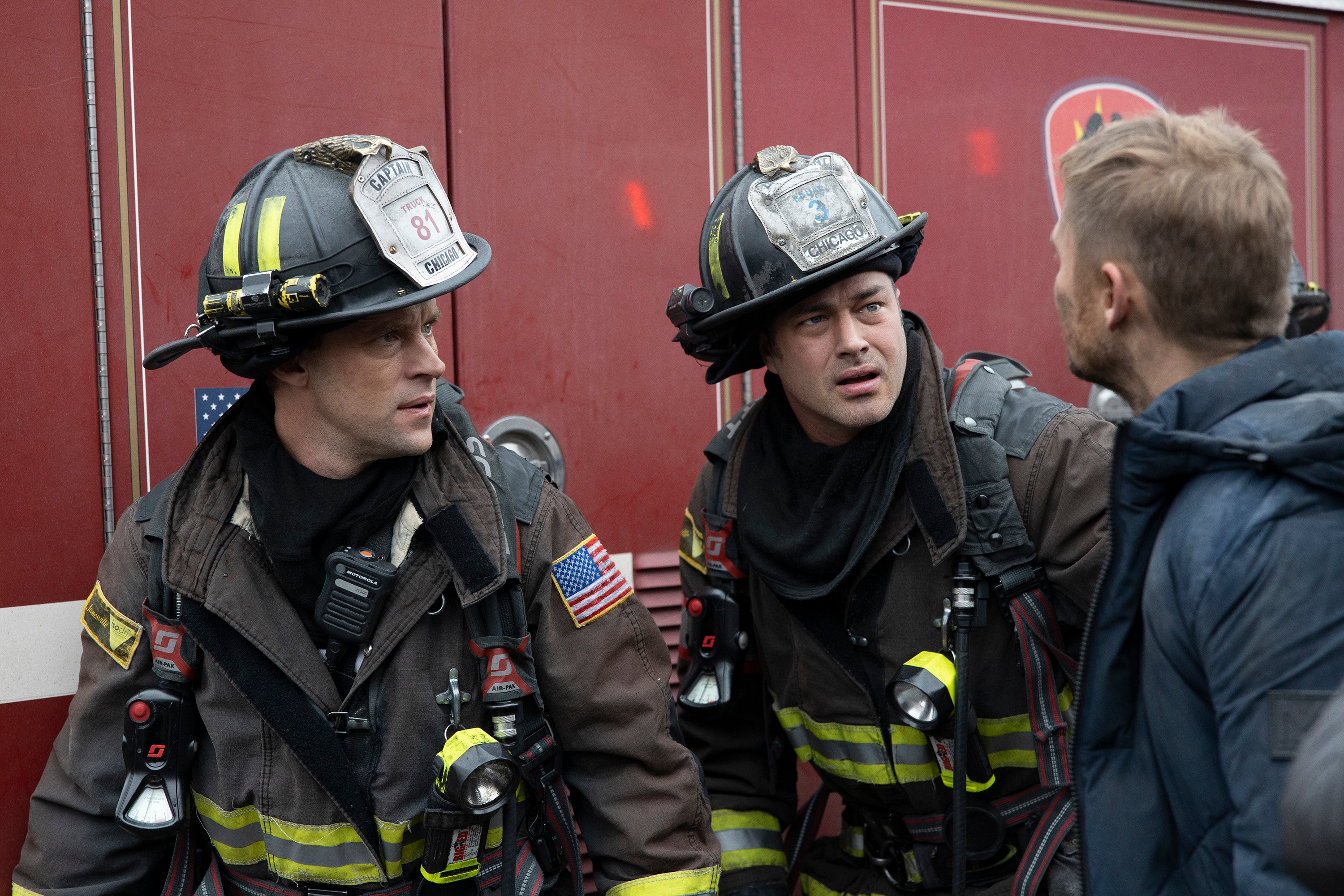 Jesse Spencer and Taylor Kinney on the set of Chicago Fire | Adrian Burrows/NBC/NBCU Photo Bank via Getty Images