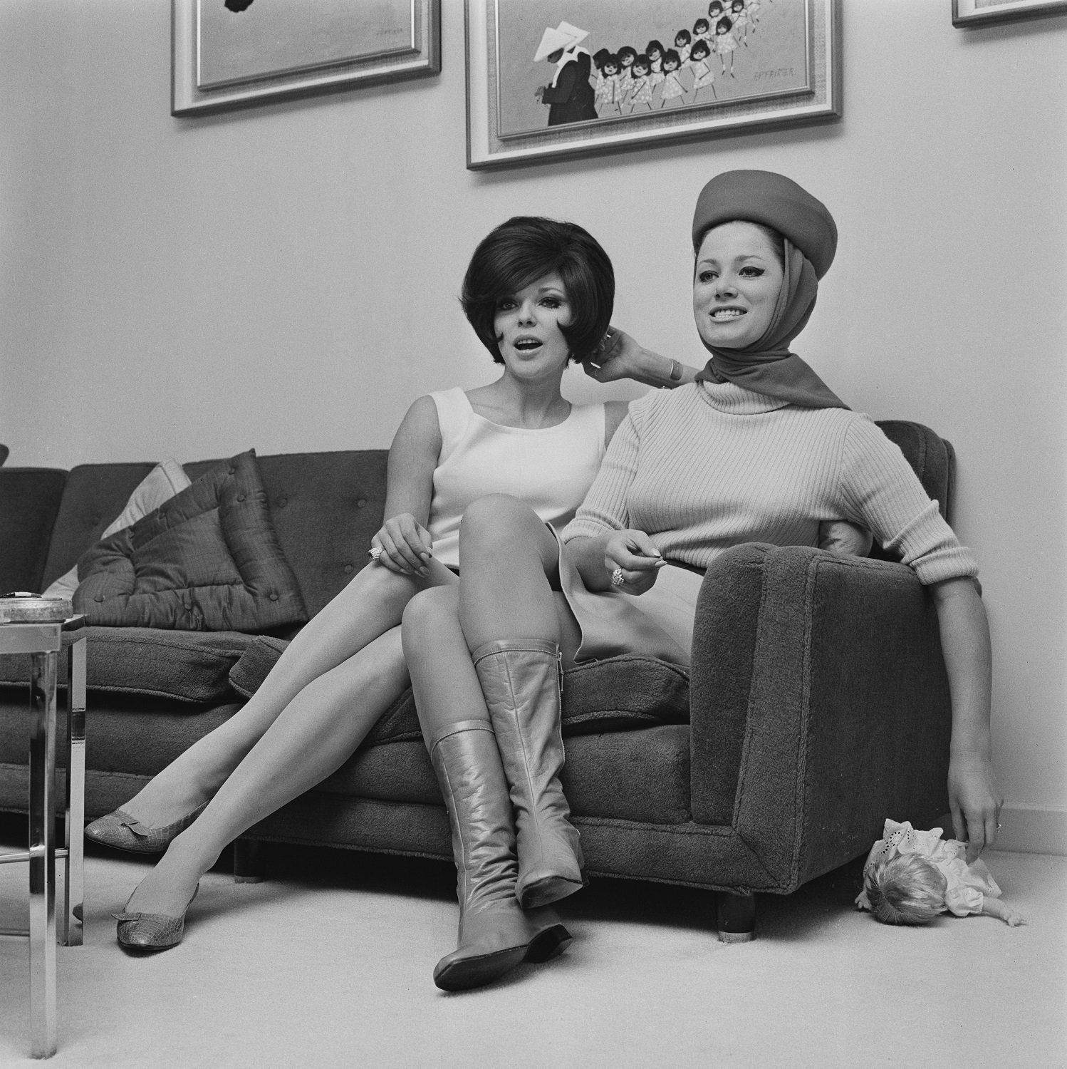 Joan Collins and Jackie Collins pose together in 1966
