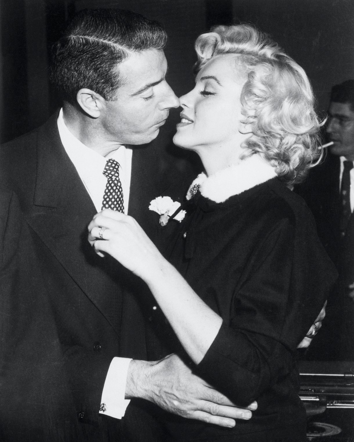 Joe DiMaggio and Marilyn Monroe Kiss