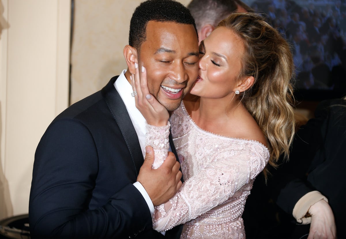 Singer John Legend (L) and model Chrissy Teigen