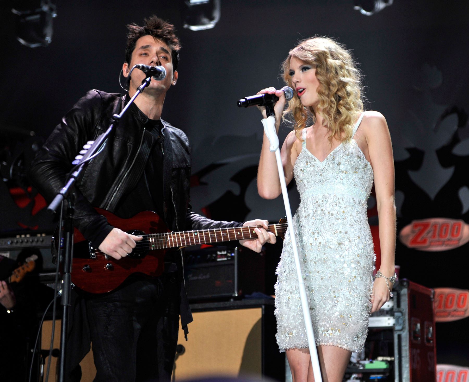 John Mayer and Taylor Swift performs onstage during Z100's Jingle Ball 2009