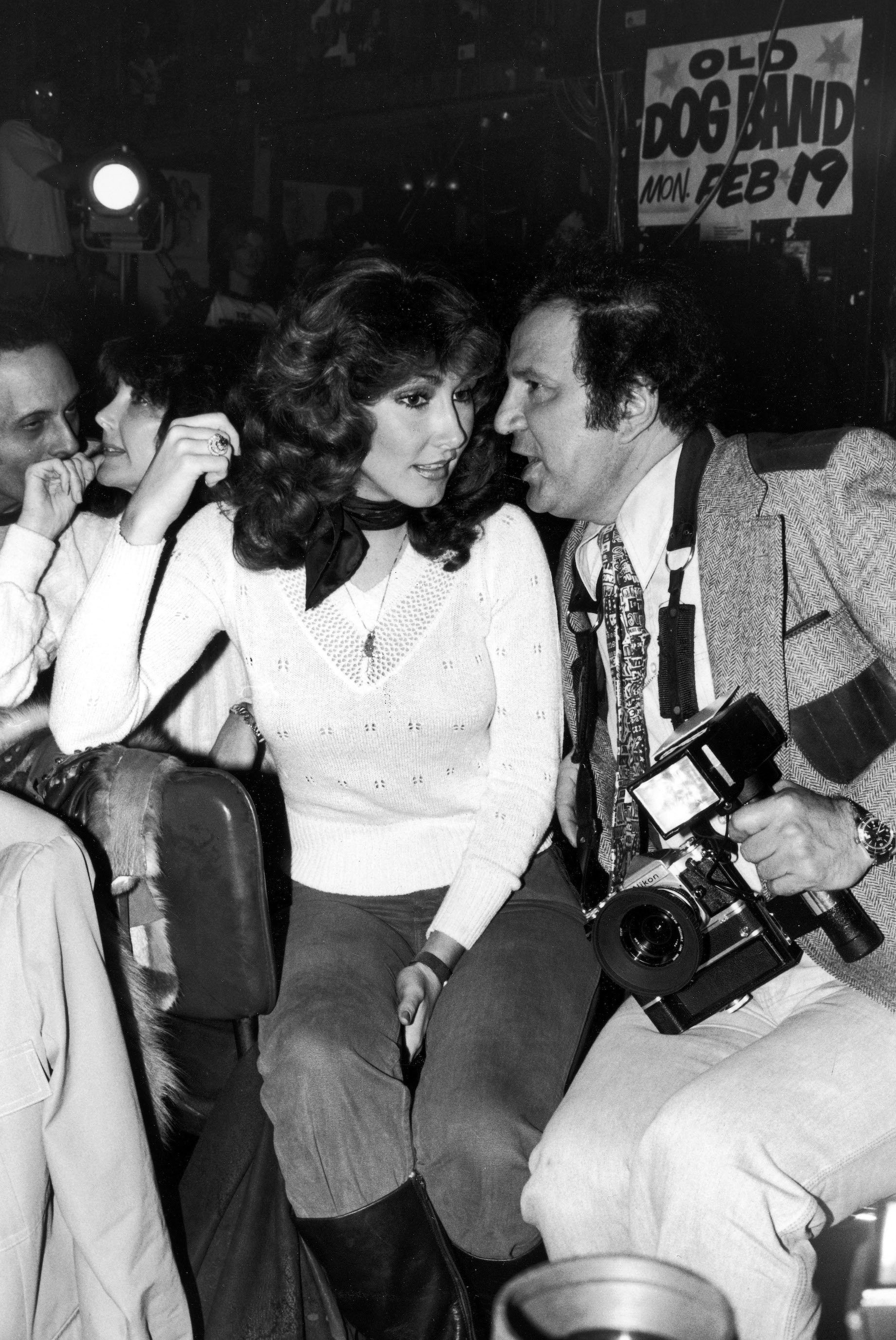 (L-R) Former girlfriend of Elvis Presley, Linda Thompson, talking to photographer Ron Galella