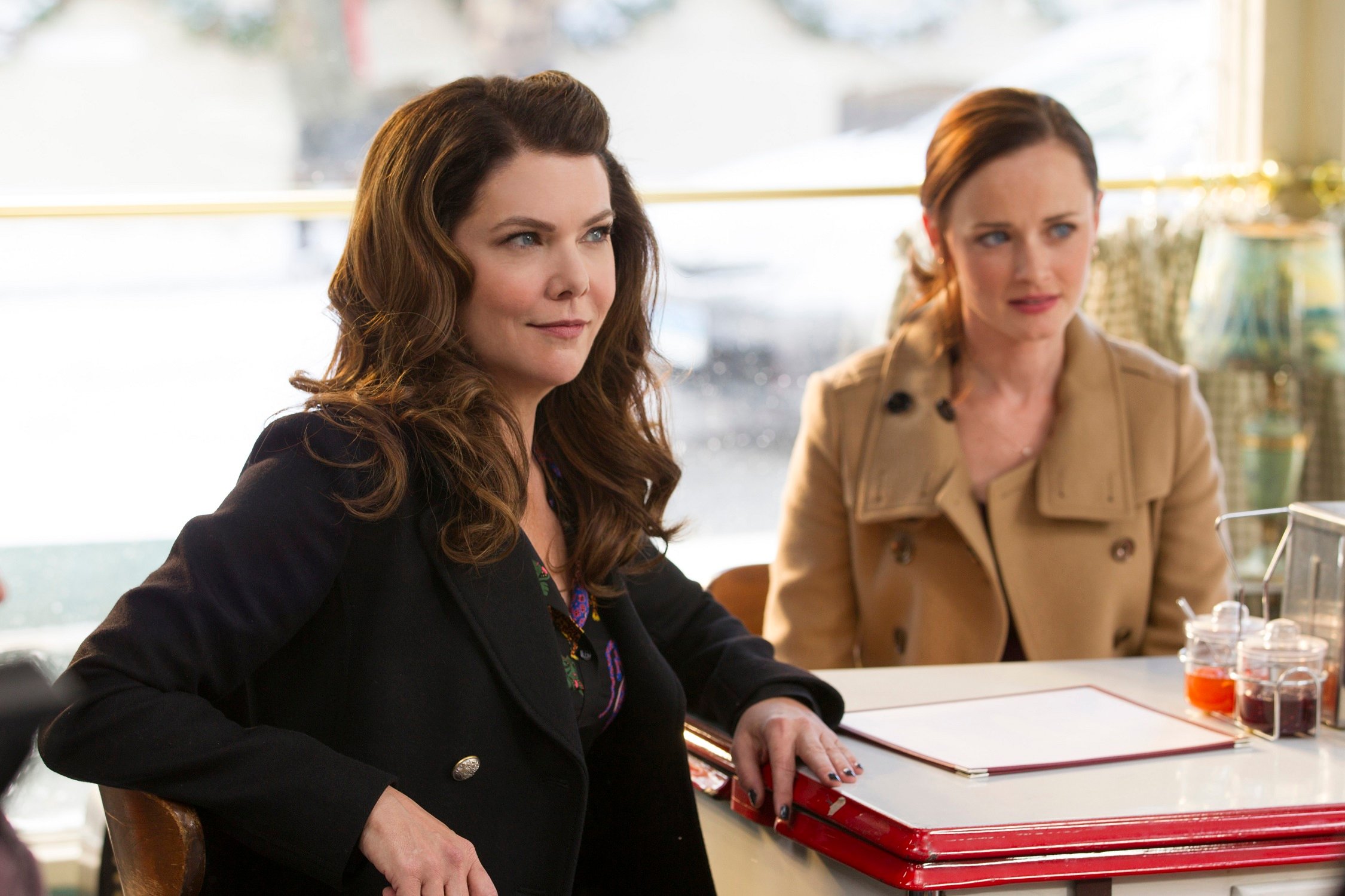 Lauren Graham as Lorelai Gilmore and Alexis Bledel as Rory Gilmore