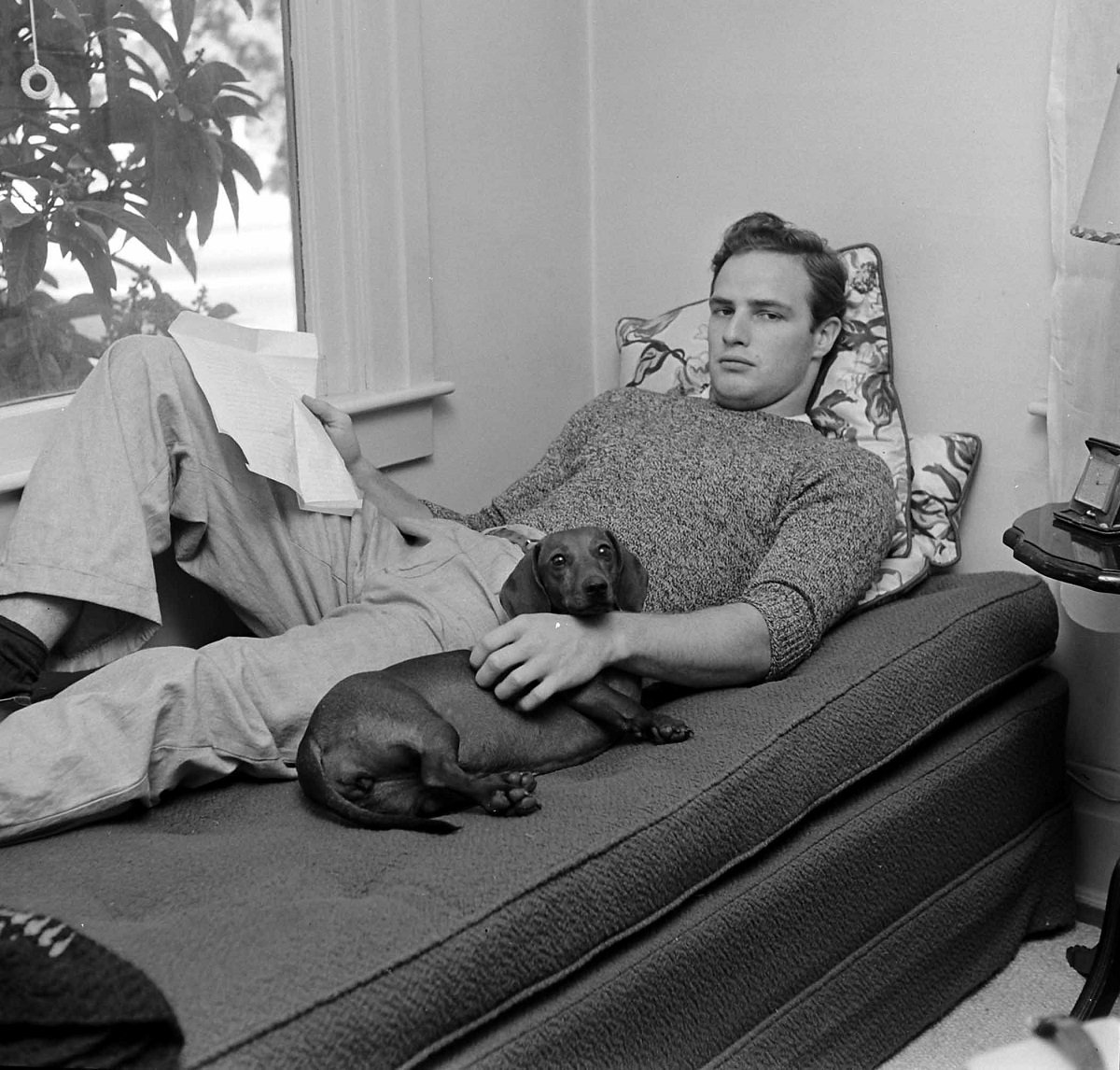 Marlon Brando with his dog in 1949