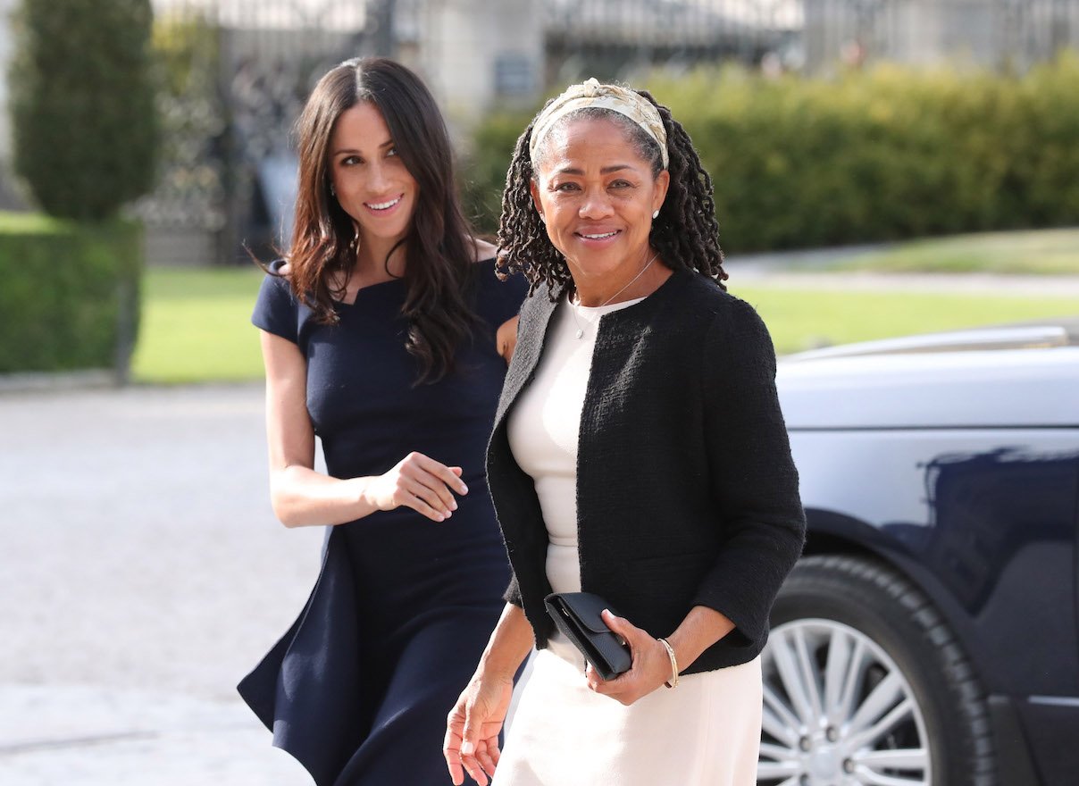 Meghan Markle family includes mother Doria Ragland and father Thomas Markle. Pictured here, Meghan and Doria arrive at the Cliveden Hotel in 2018.