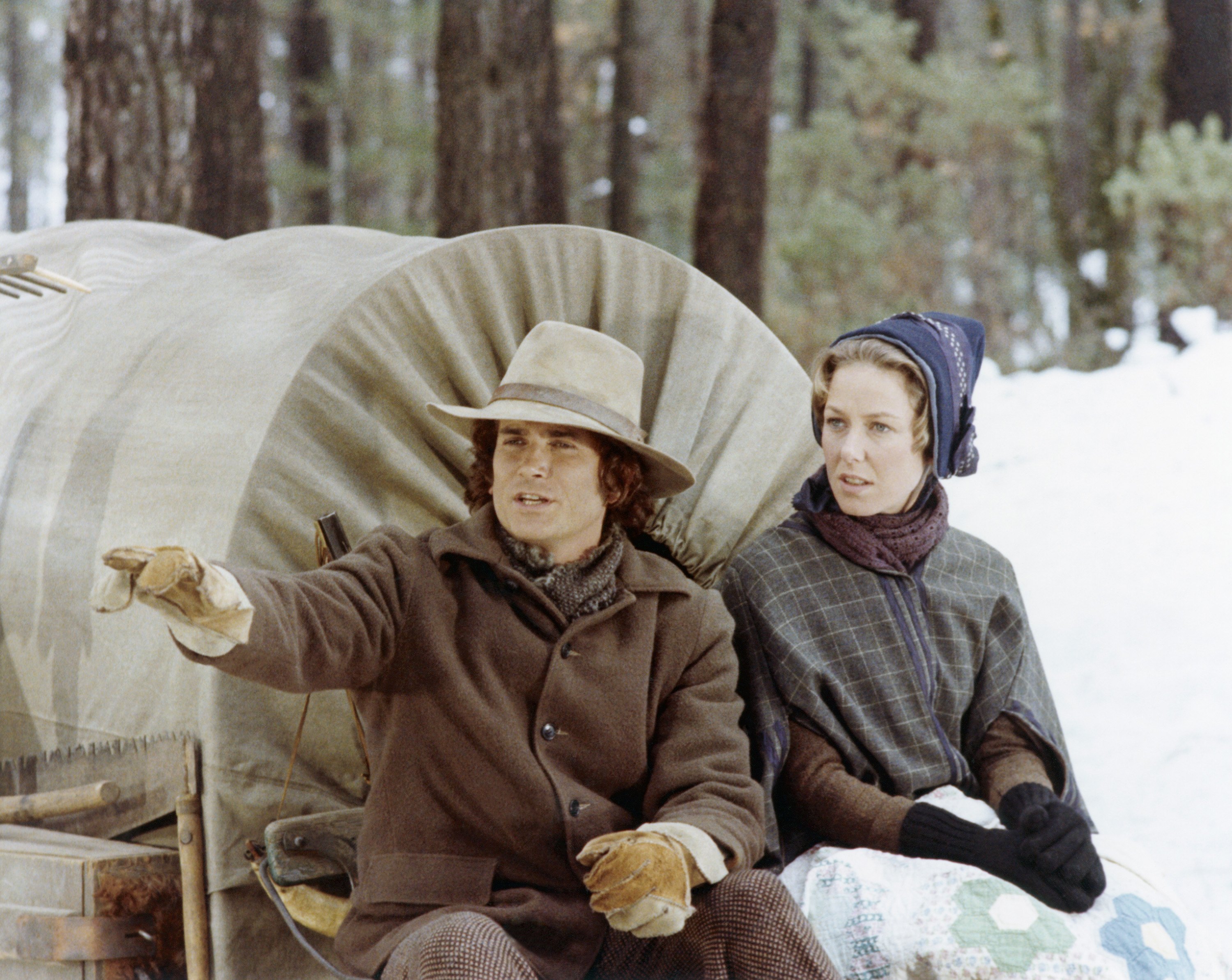 Michael Landon as Charles Philip Ingalls, Karen Grassle as Caroline Quiner Holbrook Ingalls