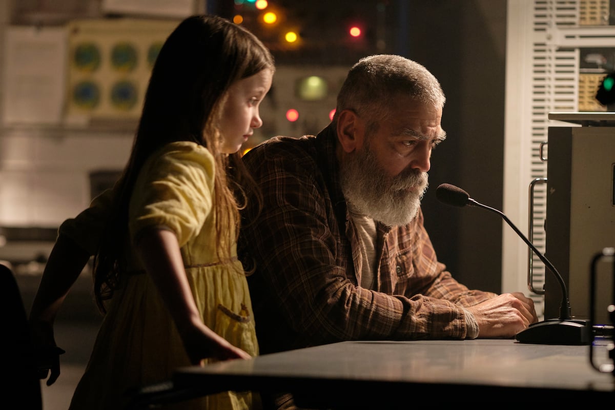 Caoilinn Springall as Iris and George Clooney as Augustine | Philippe Antonello/Netflix
