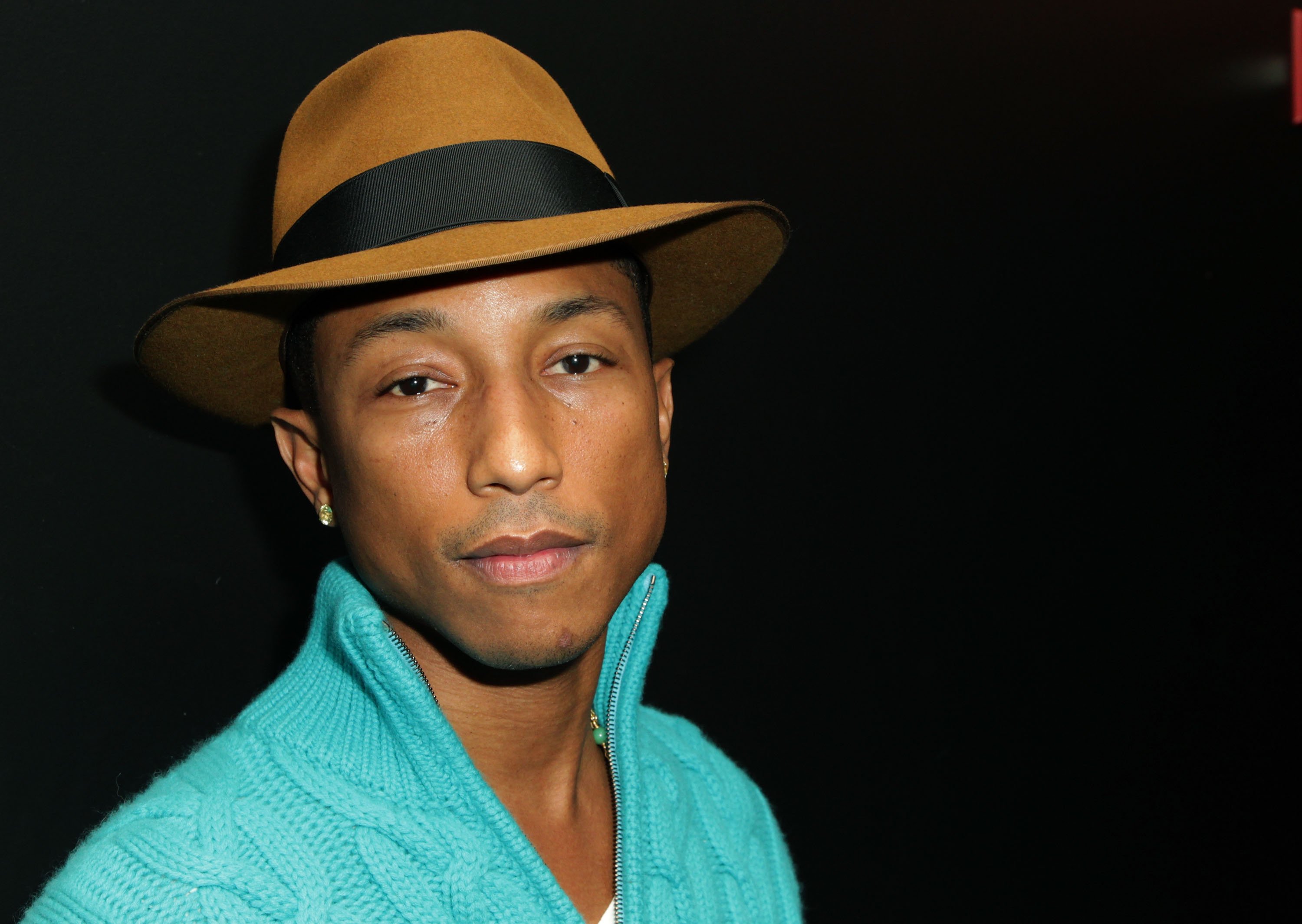 Pharrell Williams poses for a photo at an award show