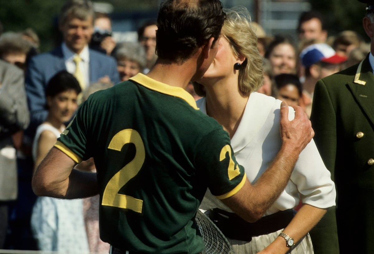 Prince Charles kisses his wife, Princess Diana