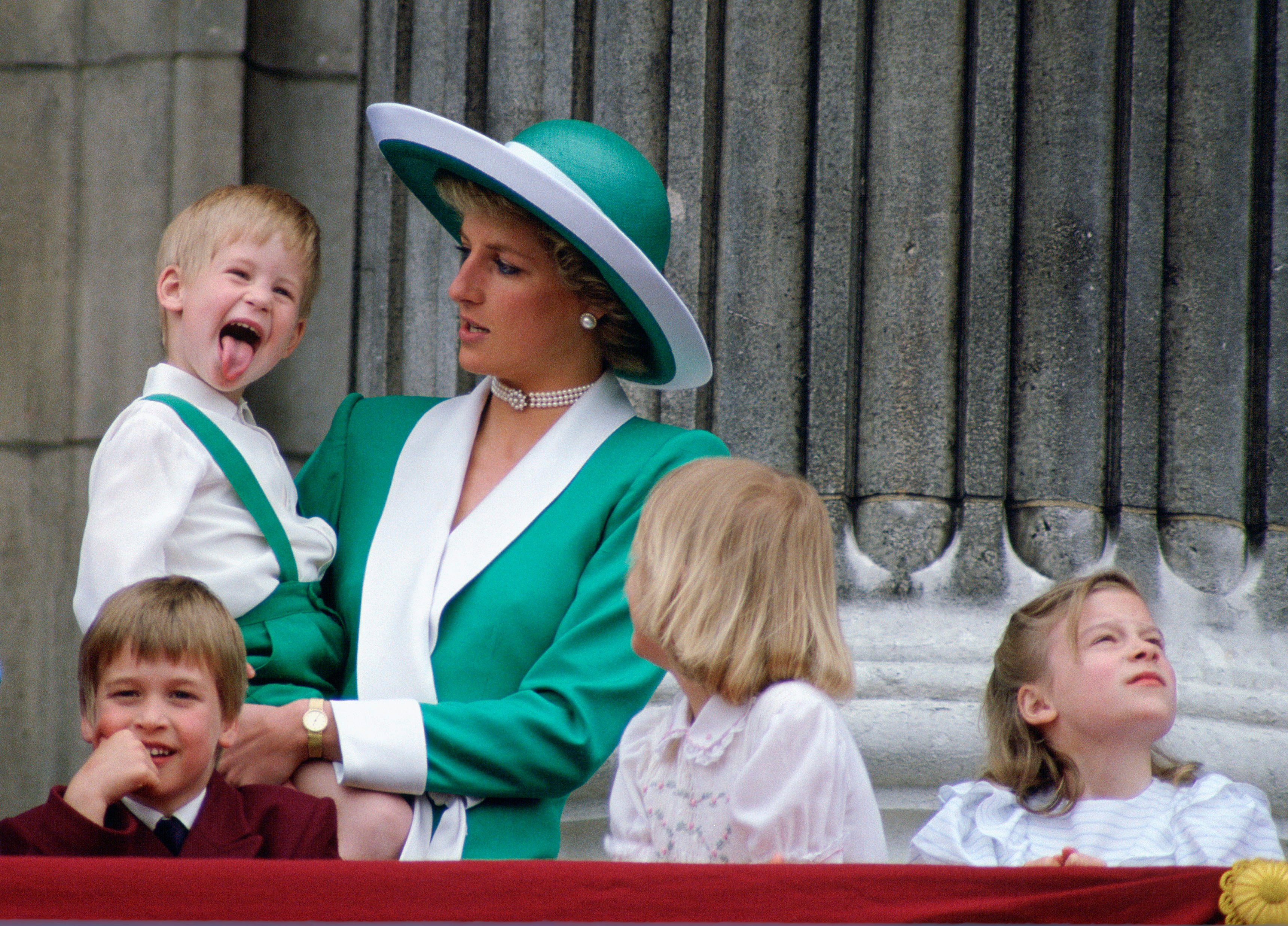 Princess Diana holding Prince Harry