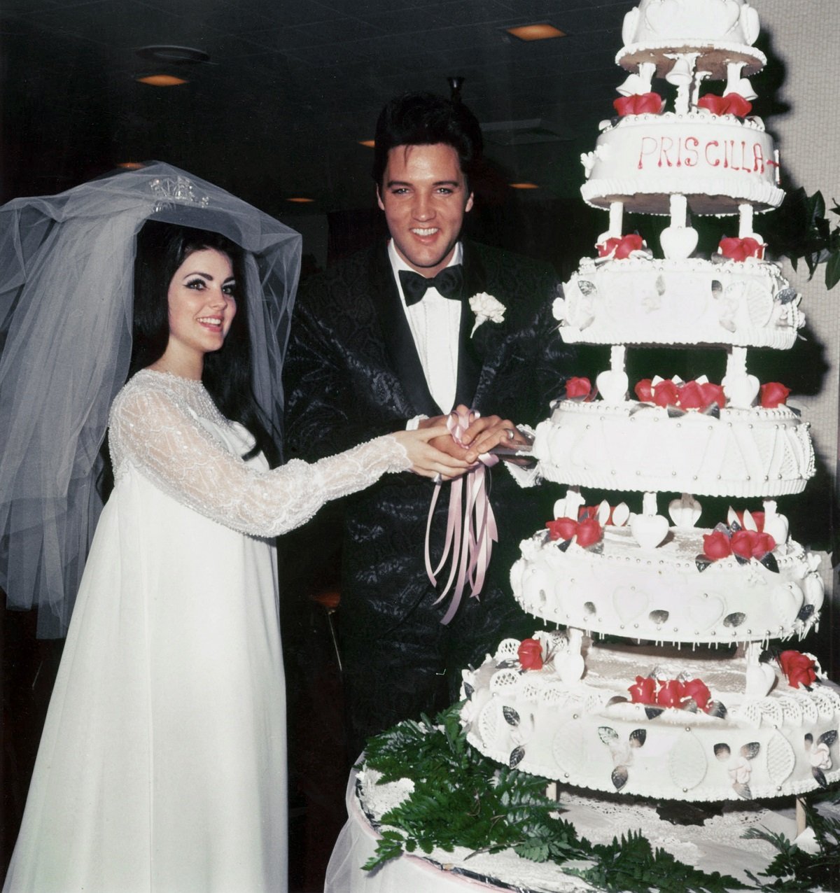 Elvis and Priscilla Presley at their wedding