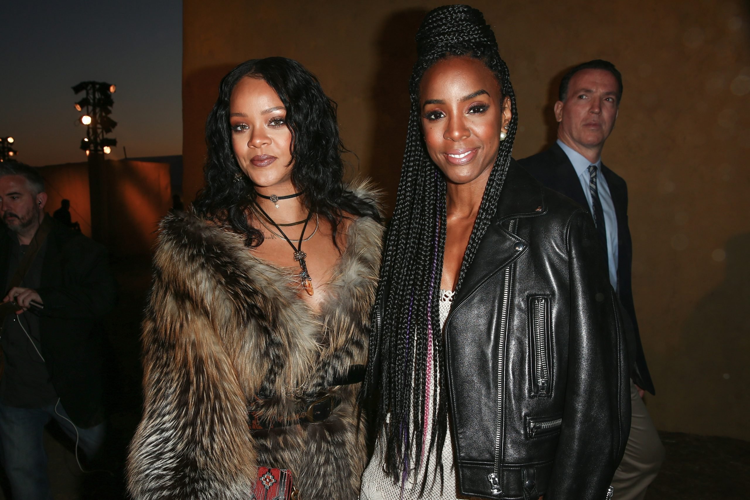 Rihanna and Kelly Rowland pose together for a photo in 2018