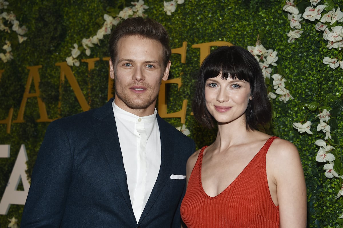 Sam Heughan (L) and actress Caitriona Balfe arrive at Starz's "Outlander