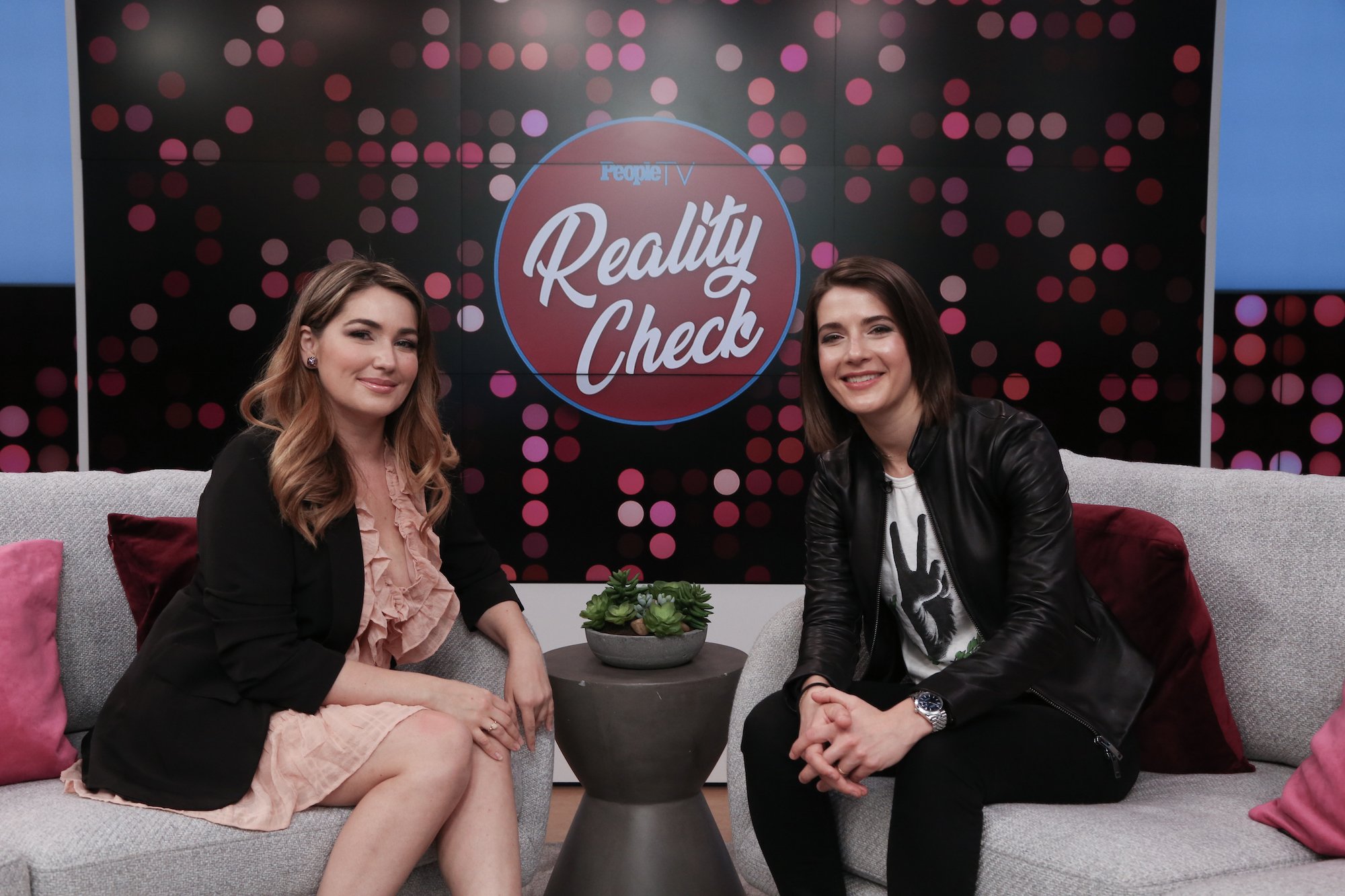 '90 Day Fiancé' star Stephanie Matto talks with host Daryn Carp on the set of "Reality Check" at PeopleTV Studios on March 03, 2020 in New York, United States