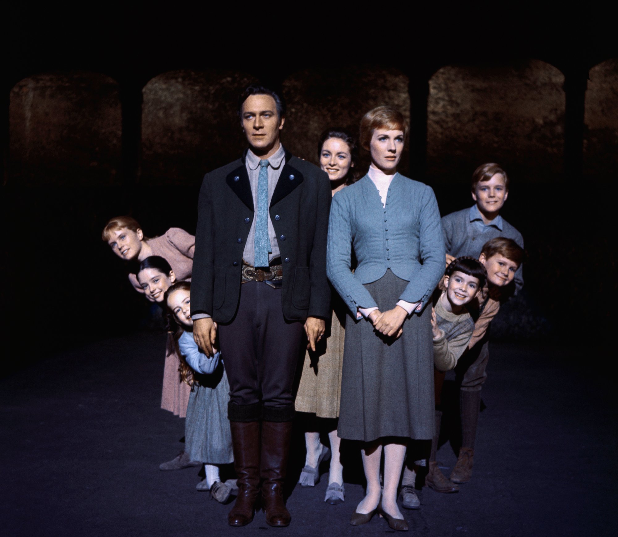 Julie Andrews and Christopher Plummer surrounded on all sides by the Von Trapp children from 'Sound of Music'