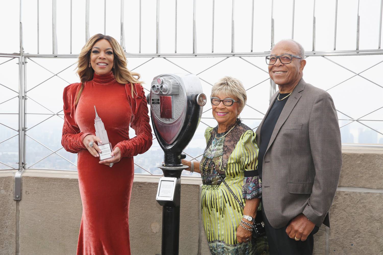 Television host, actress, author, fashion designer, and former radio personality, Wendy Williams, Shirley Williams and Thomas Williams Sr. visit The Empire State Building on September 18, 2017 in New York City.