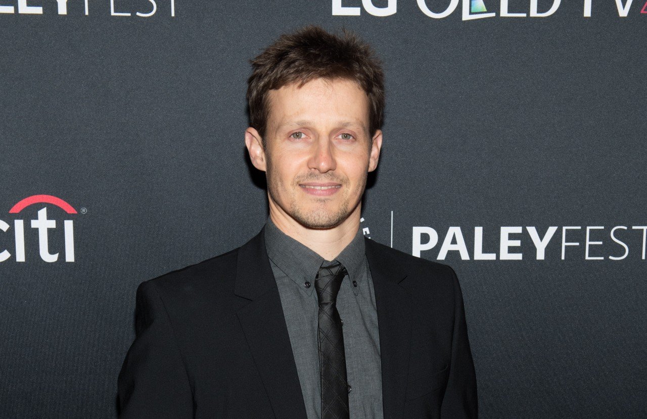 Will Estes by himself smiling for the camera