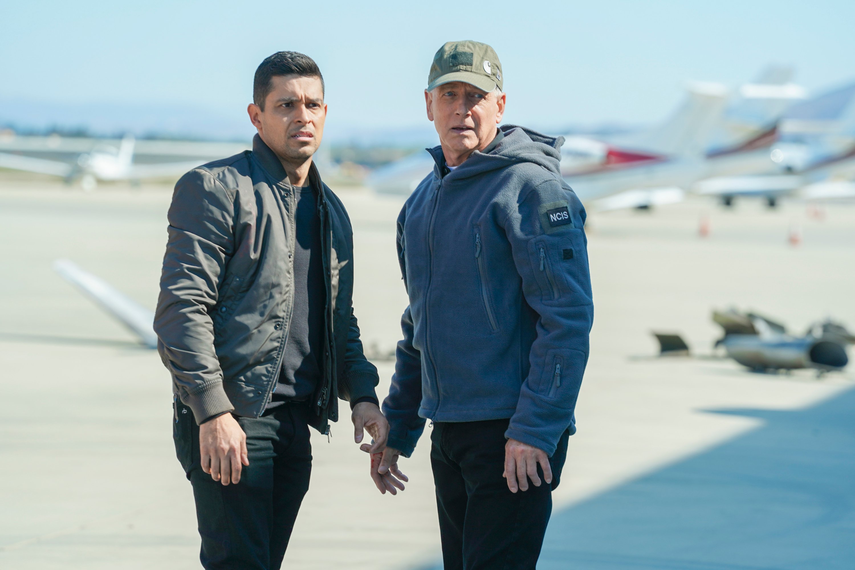 Wilmer Valderrama and Mark Harmon on the set of 'NCIS' | Sonja Flemming/CBS via Getty Images