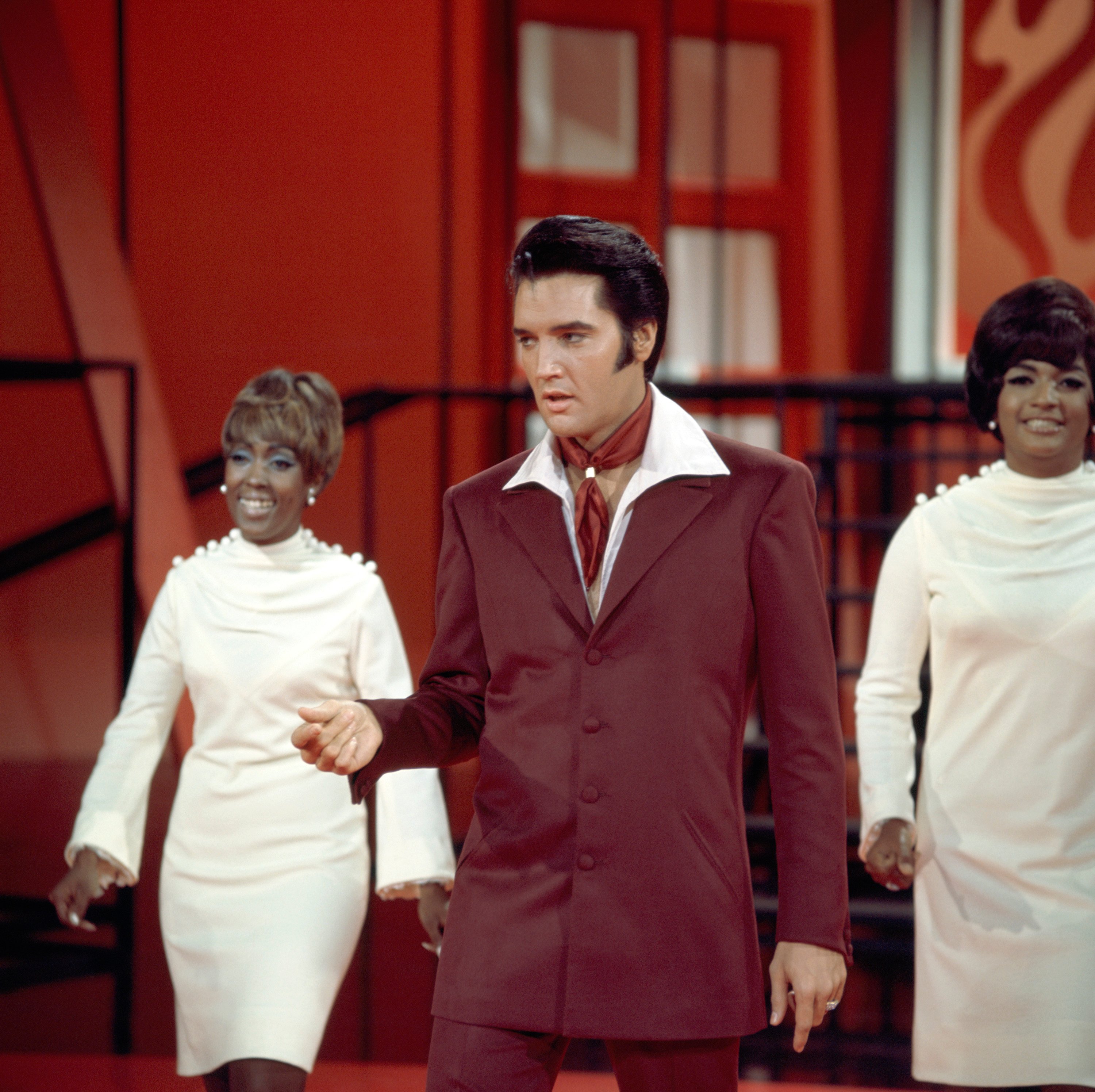 Elvis Presley and The Blossoms onstage