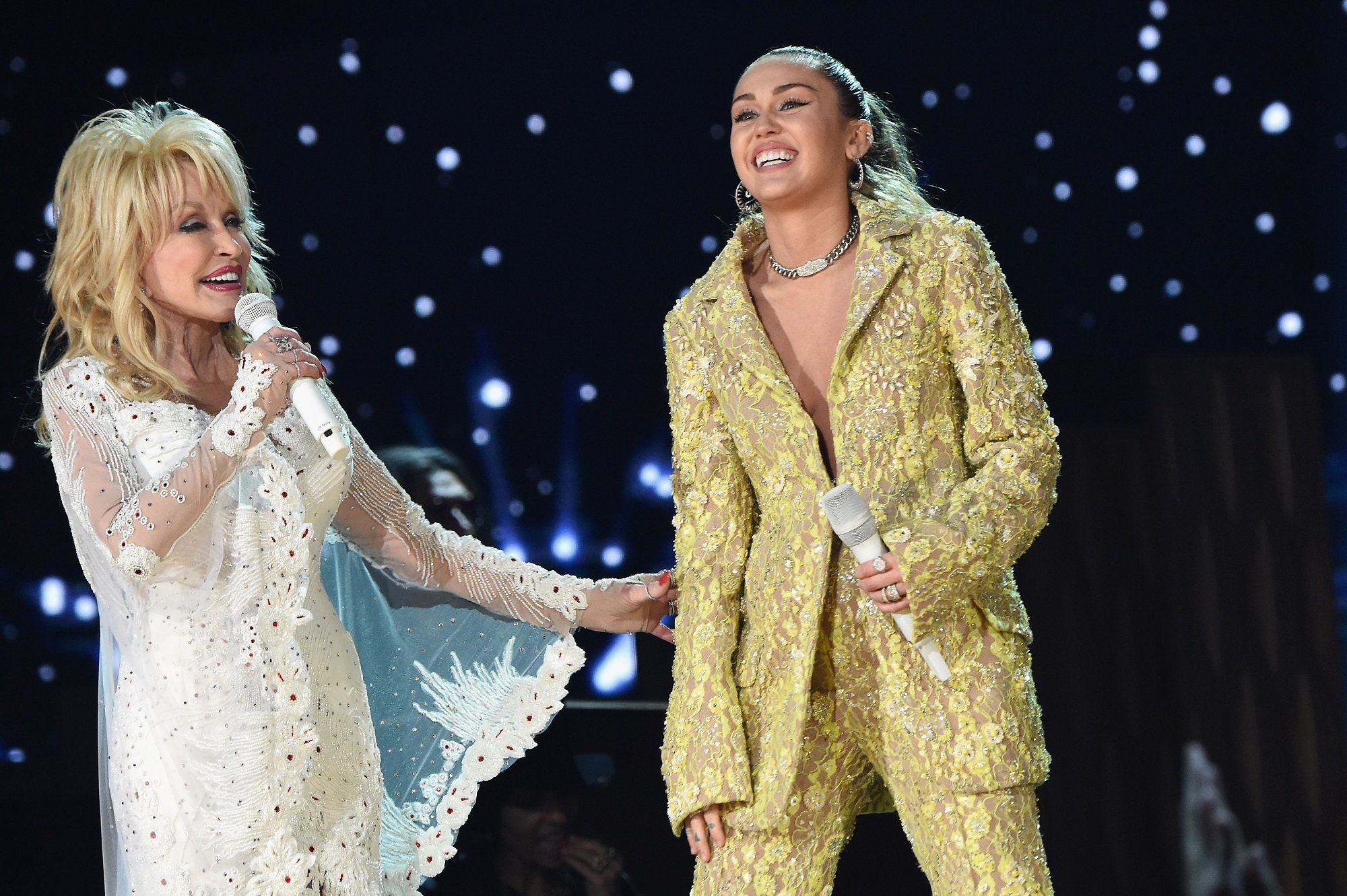 Dolly Parton (L) and Miley Cyrus perform onstage during the 61st Annual GRAMMY Awards on February 10, 2019 in Los Angeles, California.