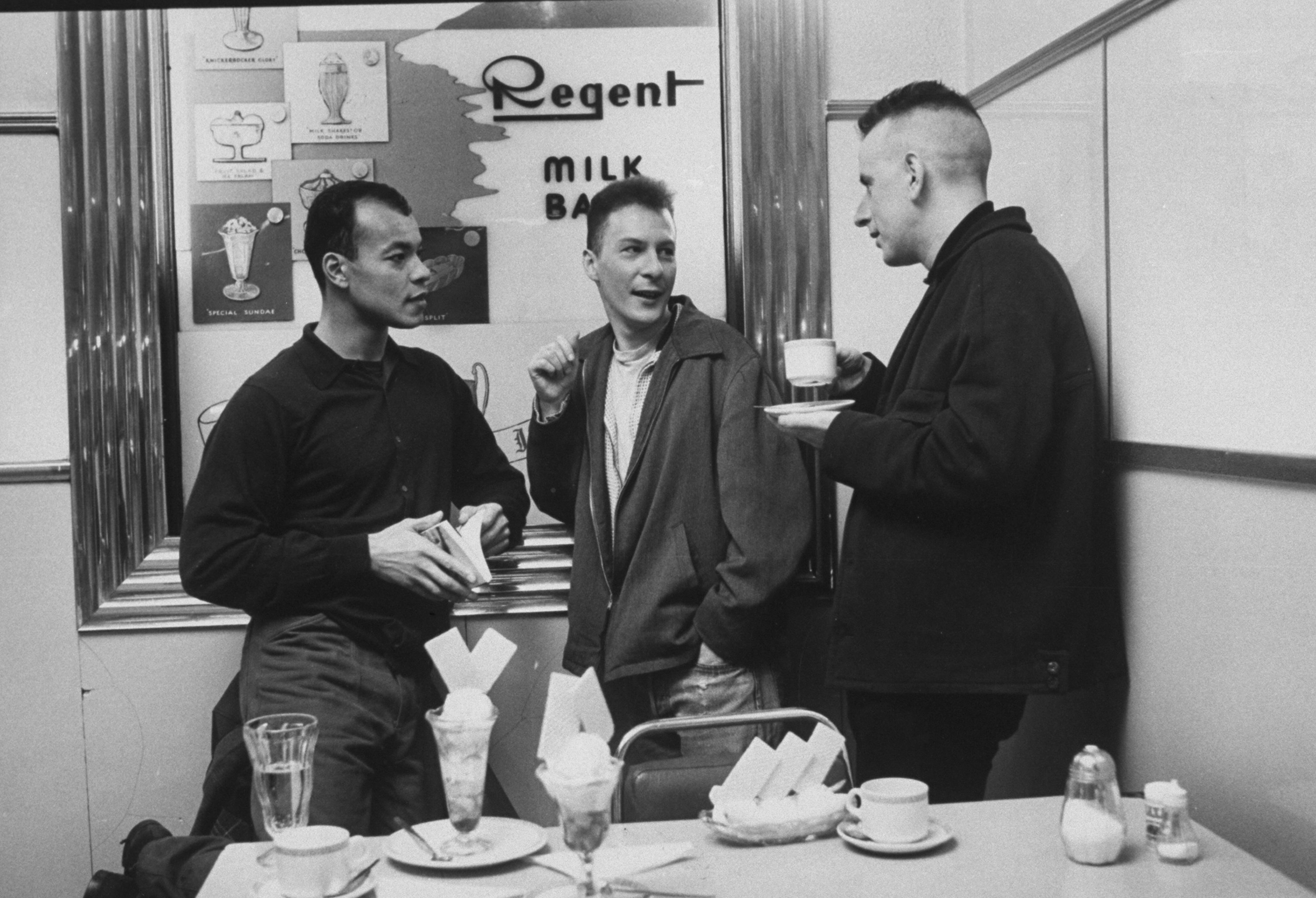 Fine Young Cannibals near a table